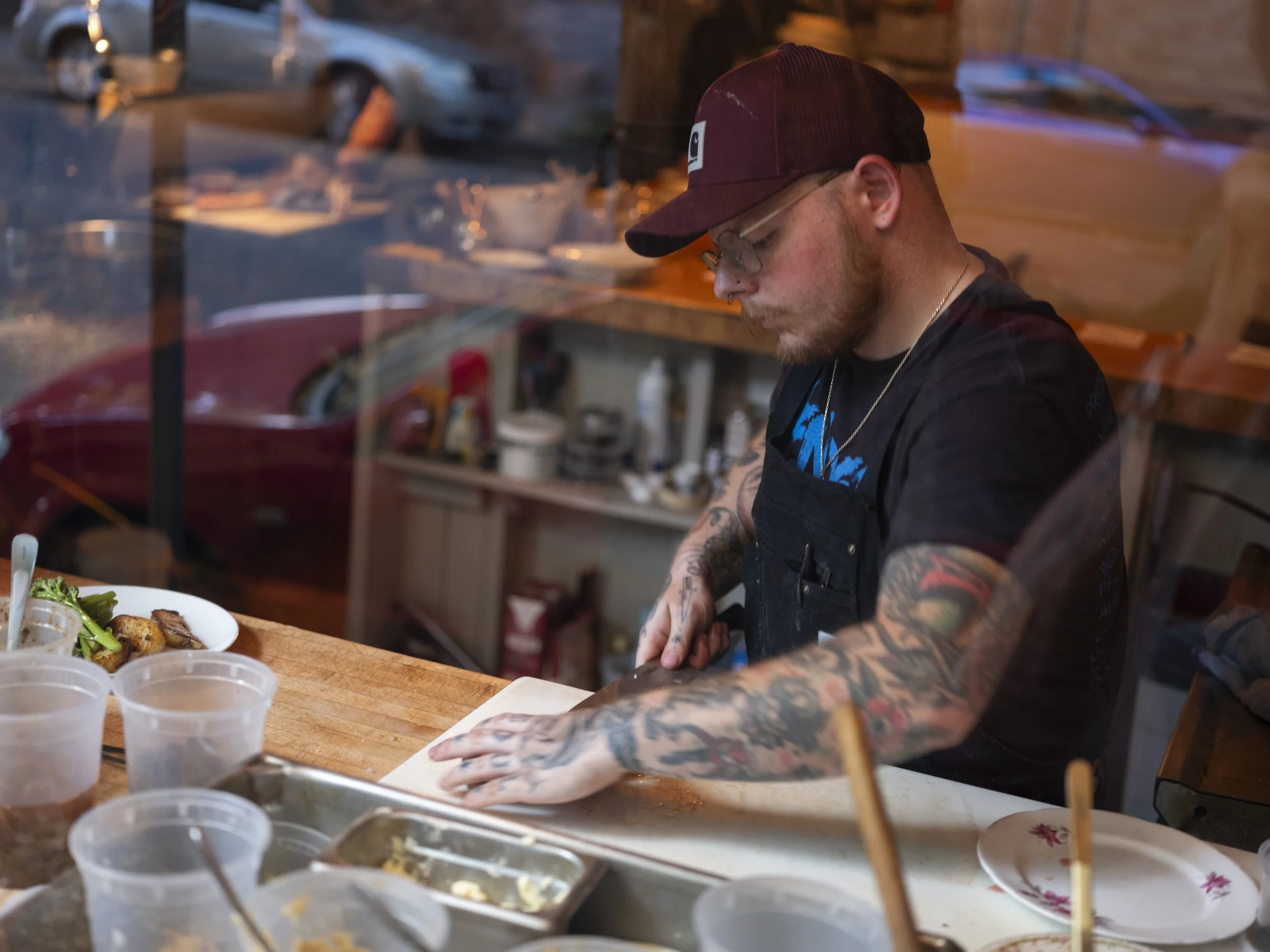 Execute Chef John Thomas prepares a dish