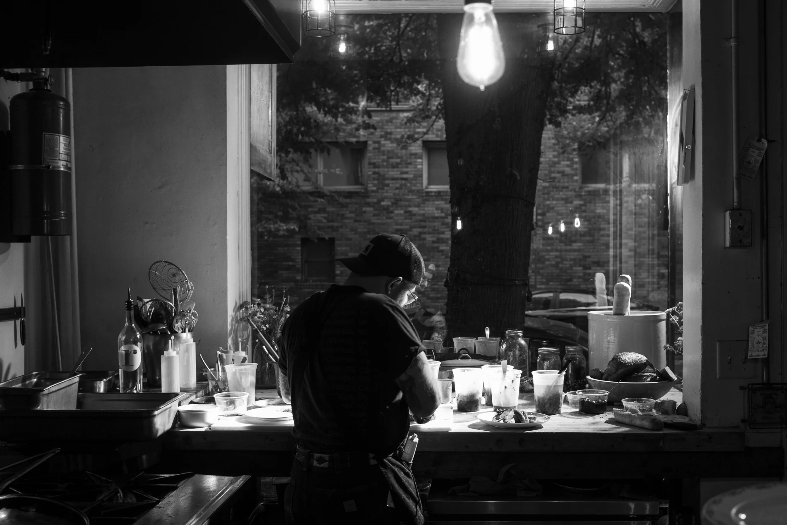 Executive Chef John Thomas finishing dinner service at Thistle Restaurant