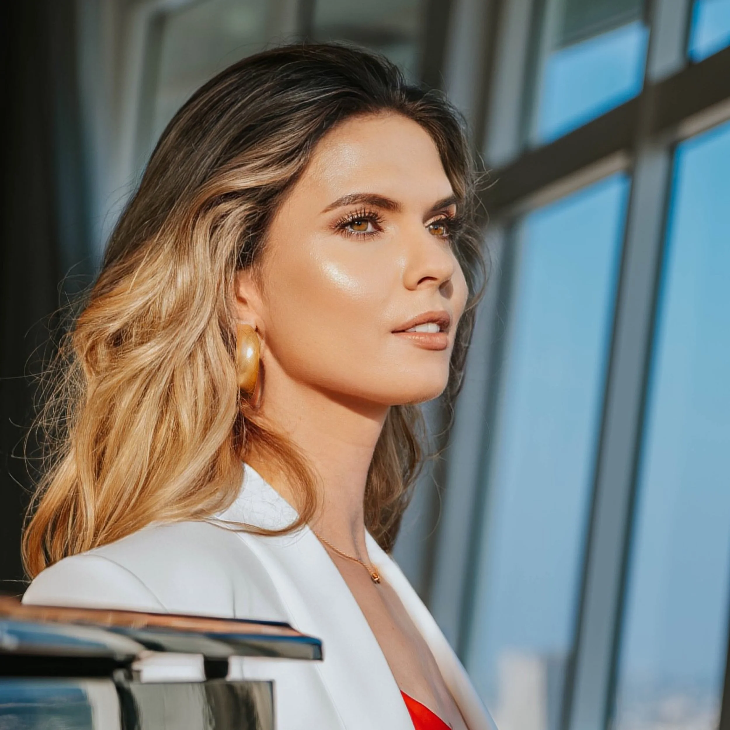 Kate, founder of Master Your Presence, in an editorial pose symbolizing refinement and precision—representing long-term self-presentation coaching for women in leadership and visibility.