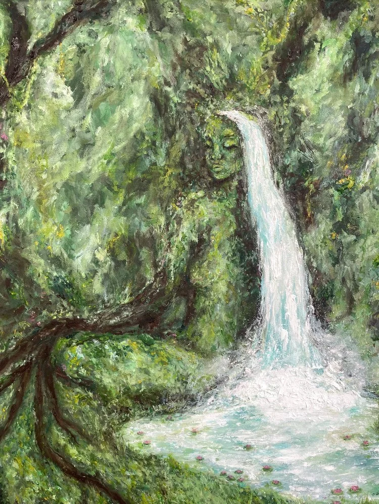 Waterfall flowing through a dense green forest with a rock face carved into a face, surrounded by lush trees and greenery.