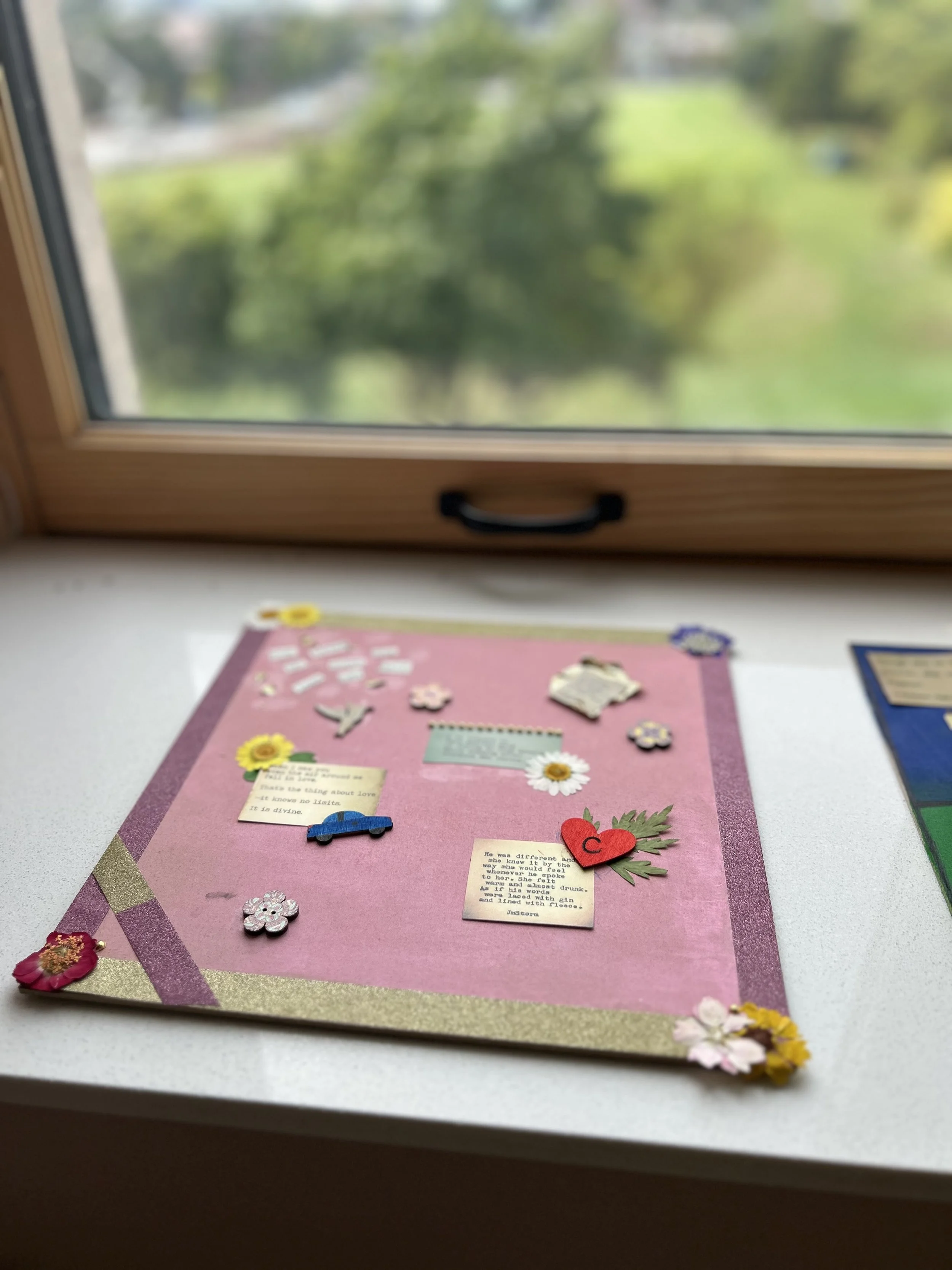 a pink board with quotes and stickers created by a survivor during our survivor forum event