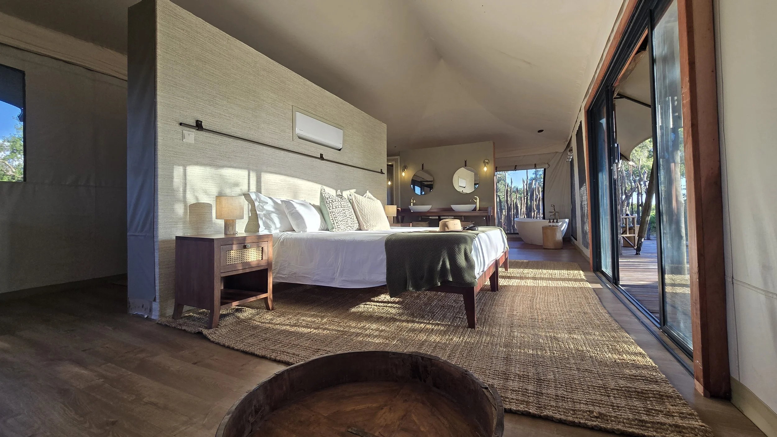 20250703_ManaSandsMainCamp_Interiors_BedthroughtoBath.jpg