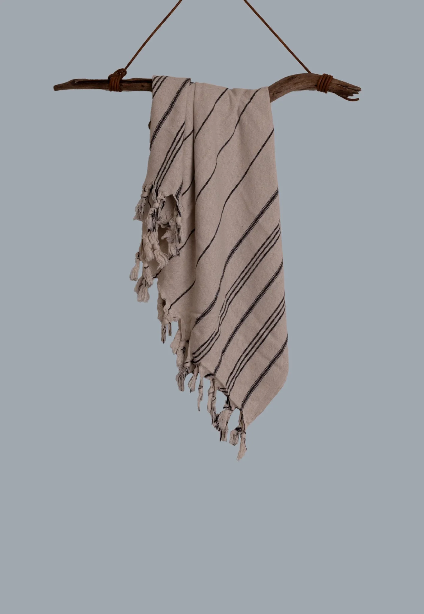 toalla de playa colgada