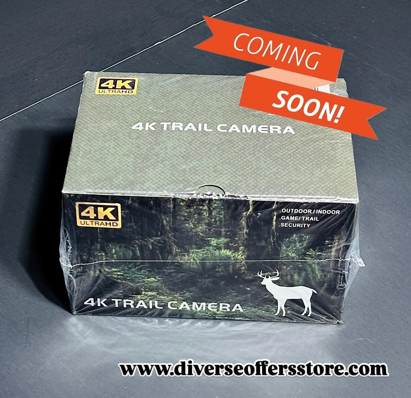 4K Ultra HD trail camera box with "Coming Soon!" text and website link. Features indicate outdoor and indoor use, game and trail monitoring, and security applications.