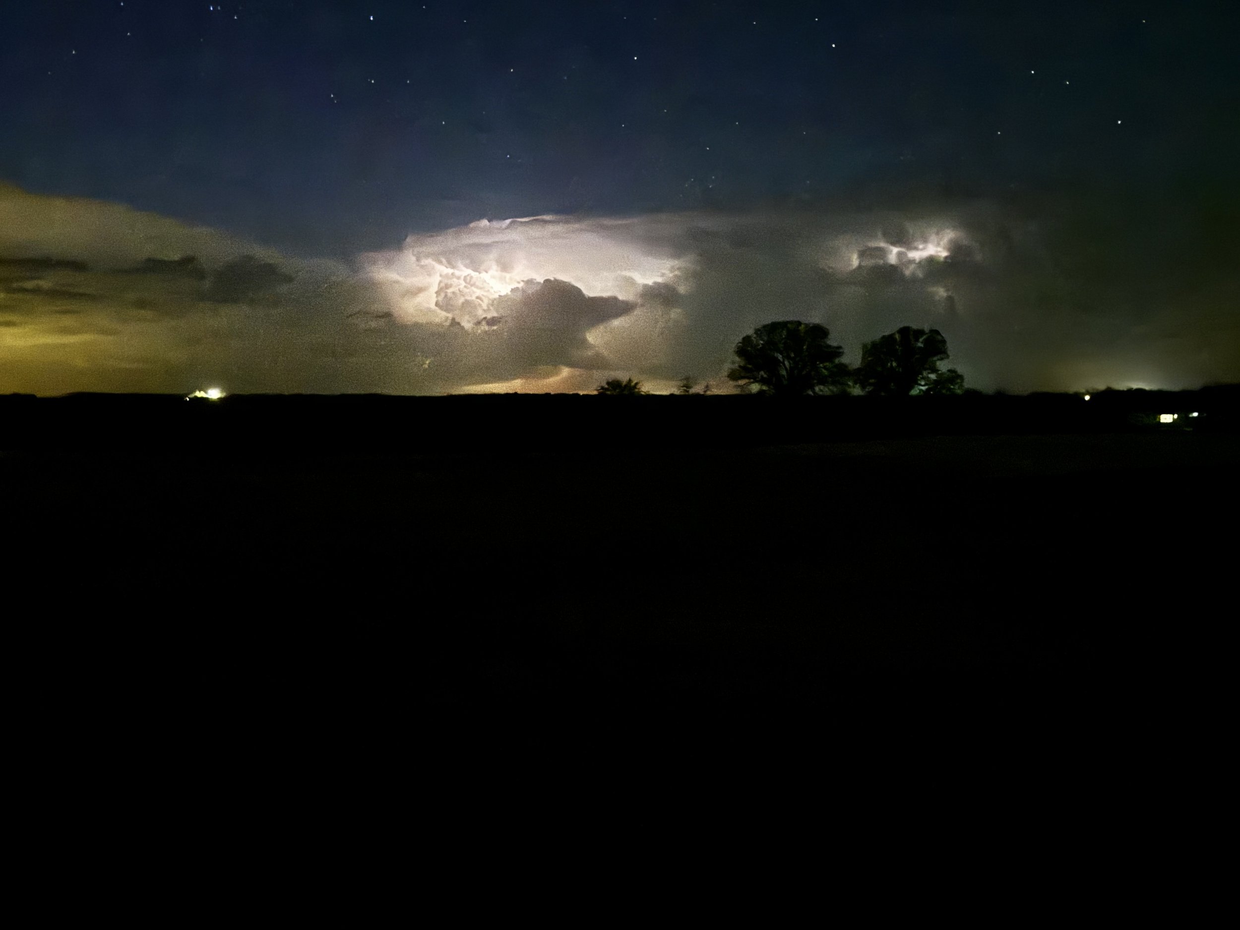 A distant storm lights up the night sky, revealing the quiet power and beauty of nature’s design. Captured at The Essex Ranch, these moments reflect the sky in motion—bold, silent, unforgettable.