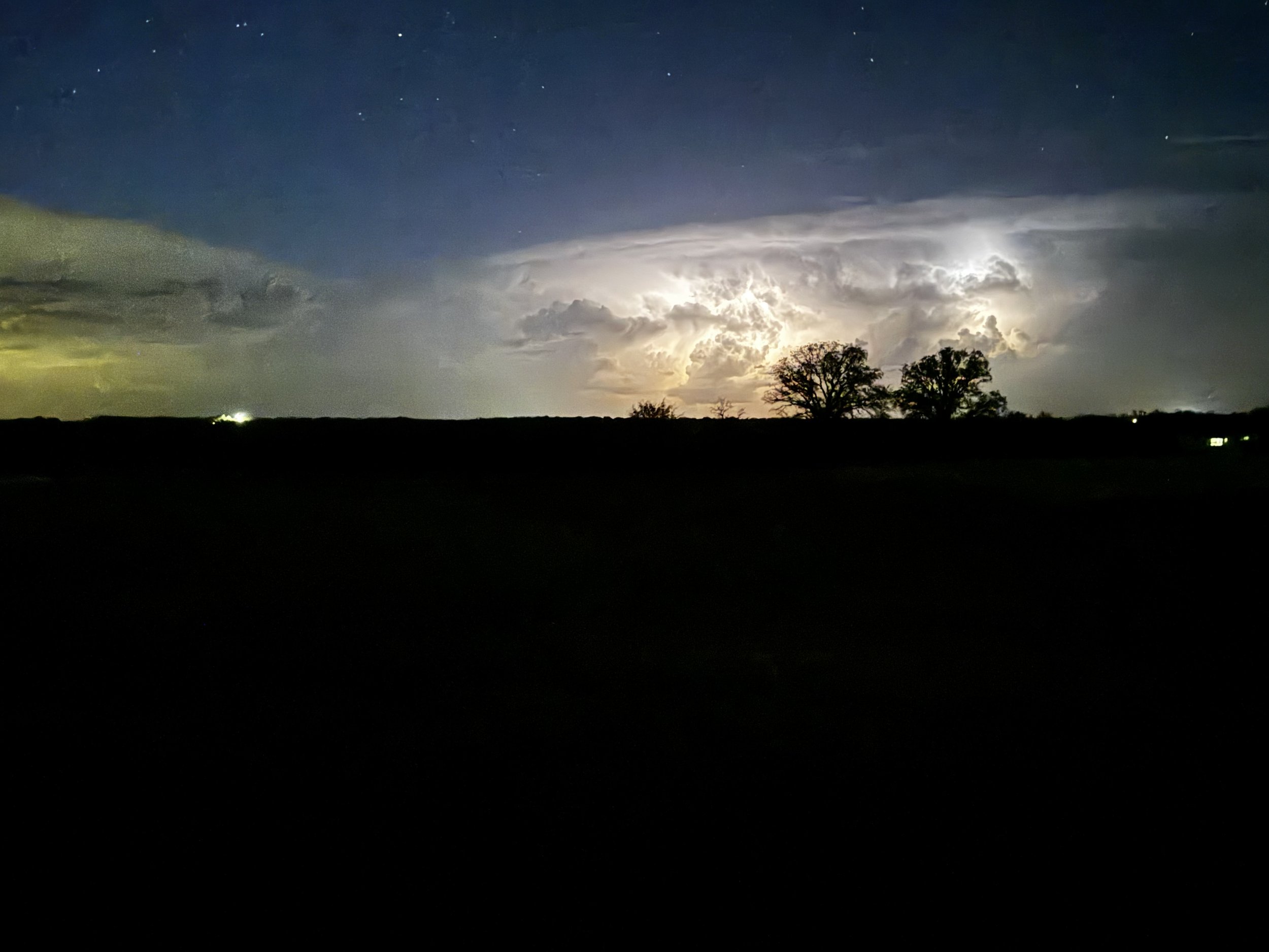 A distant storm lights up the night sky, revealing the quiet power and beauty of nature’s design. Captured at The Essex Ranch, these moments reflect the sky in motion—bold, silent, unforgettable.