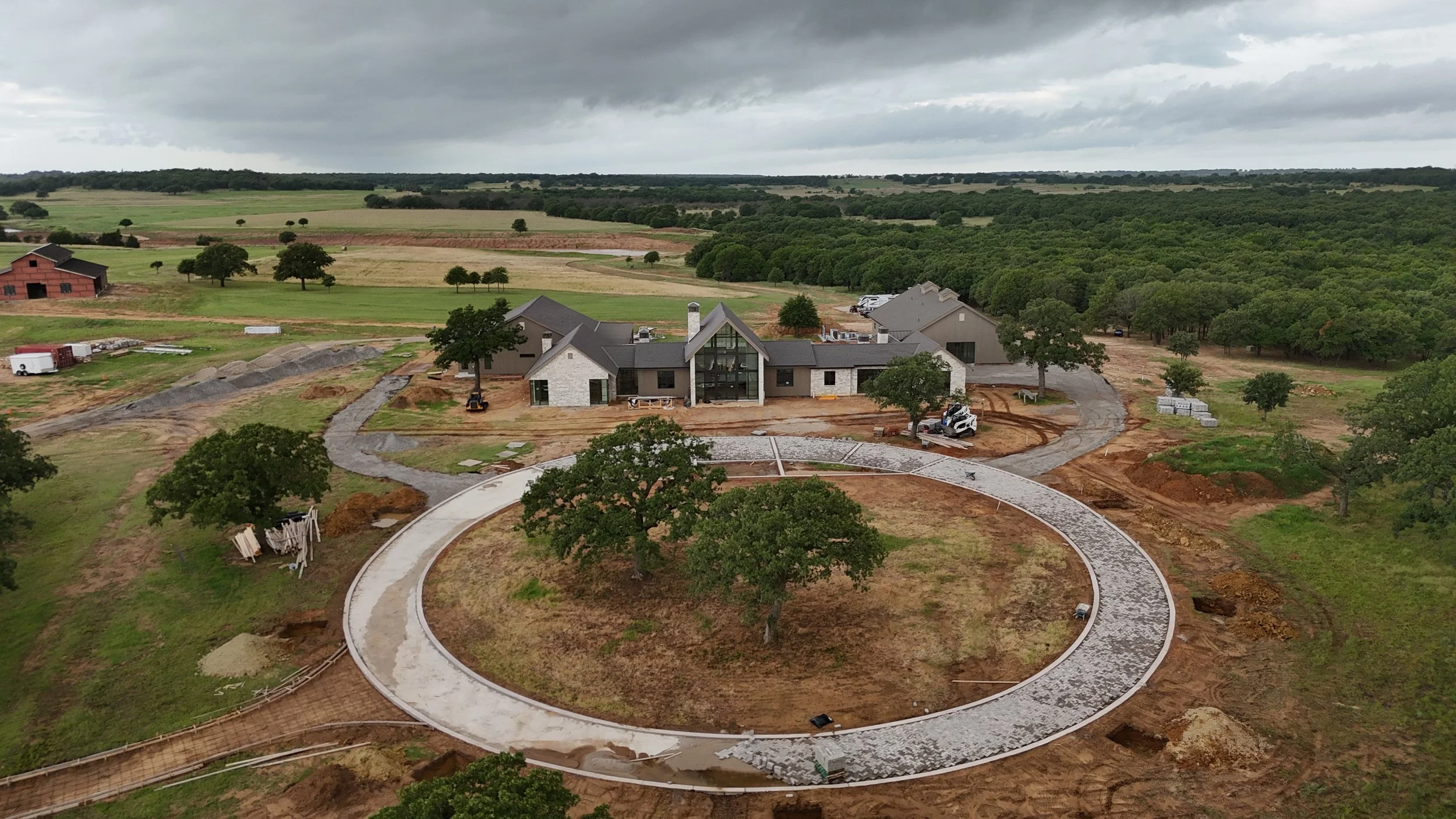 
Aerial view of the main house and circle driveway under construction at The Essex Ranch.
