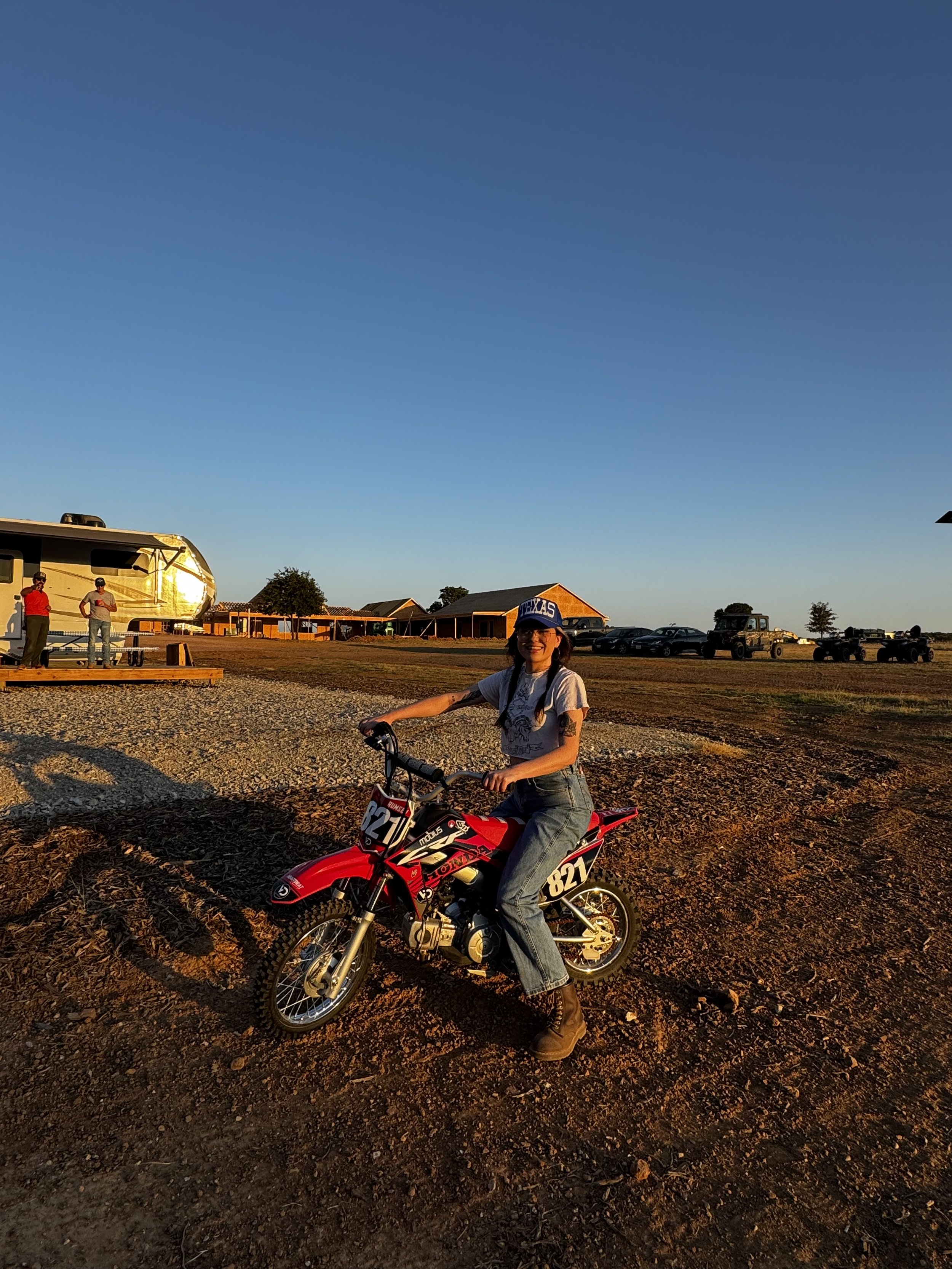 Hunter takes to the dirt bike as the sun sets over The Essex Ranch. This stunning shot perfectly captures Hunter’s adventurous spirit and love for outdoor freedom against the breathtaking backdrop of the ranch.
