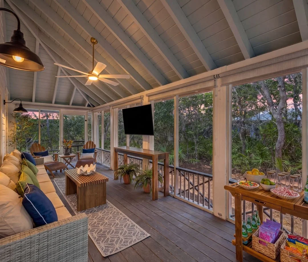 Covered porch at dusk at The Big Sea, 30A beach house