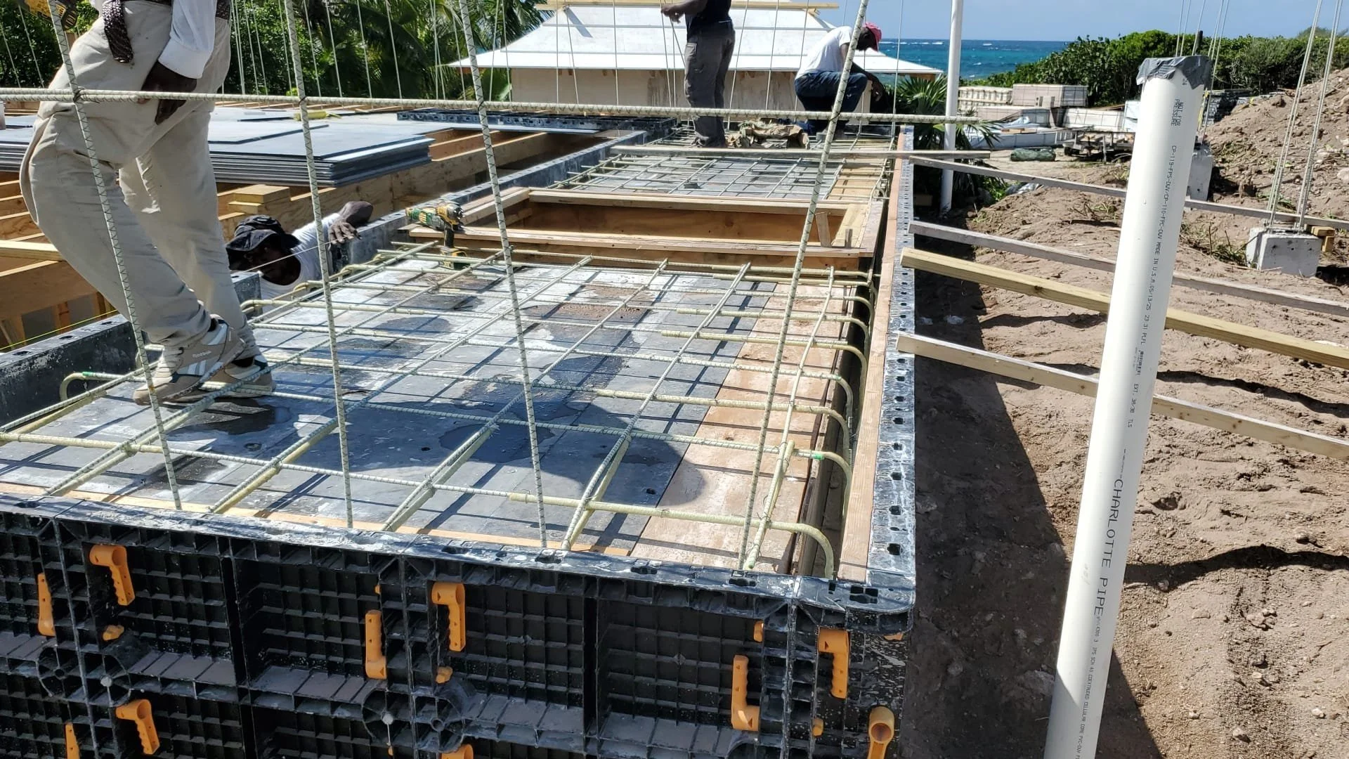 Corrosion-resistant fiberglass rebar installed in concrete foundation for coastal construction in the Bahamas