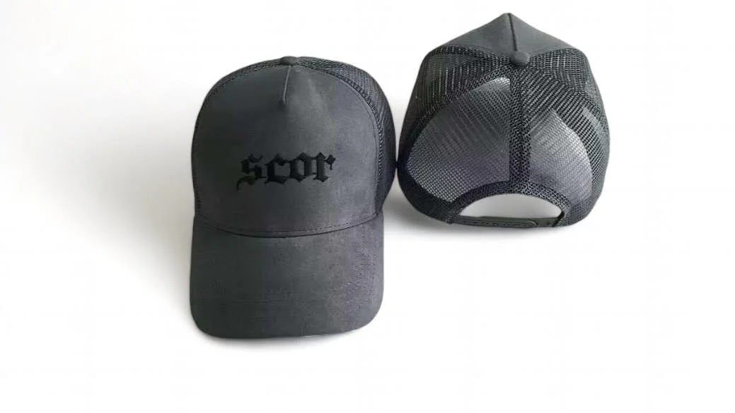Grey suede cap with the letters 'SCOR' embroidered on the front, shown from front and back views.