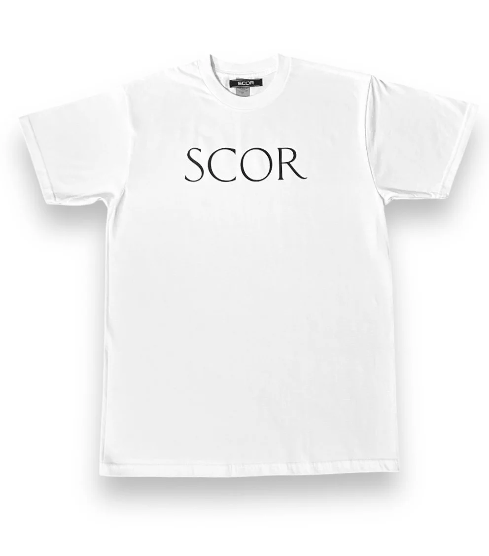 White T-shirt with the word "SCOR" printed on the front.