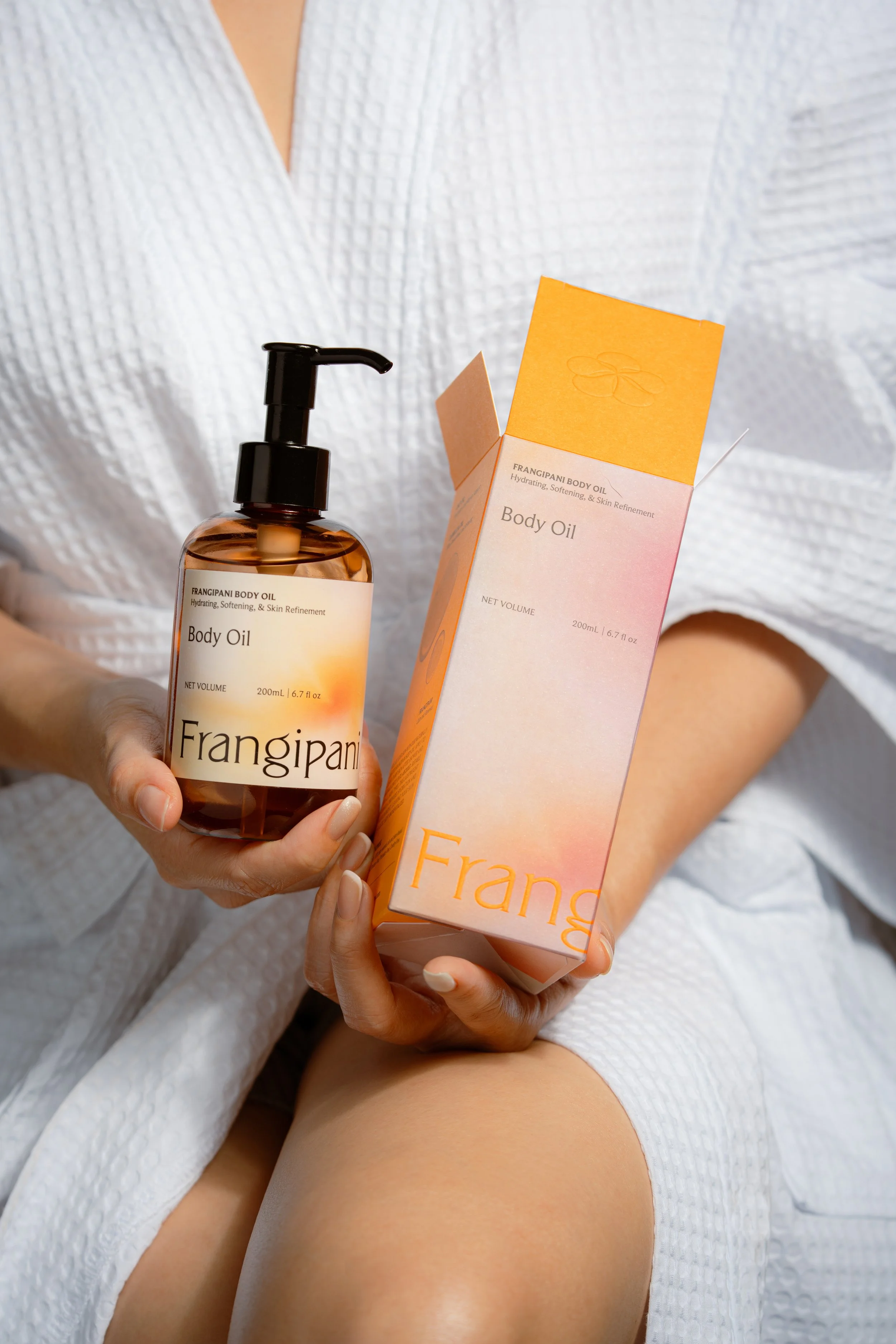 frangipani_body_oil_with_packaging