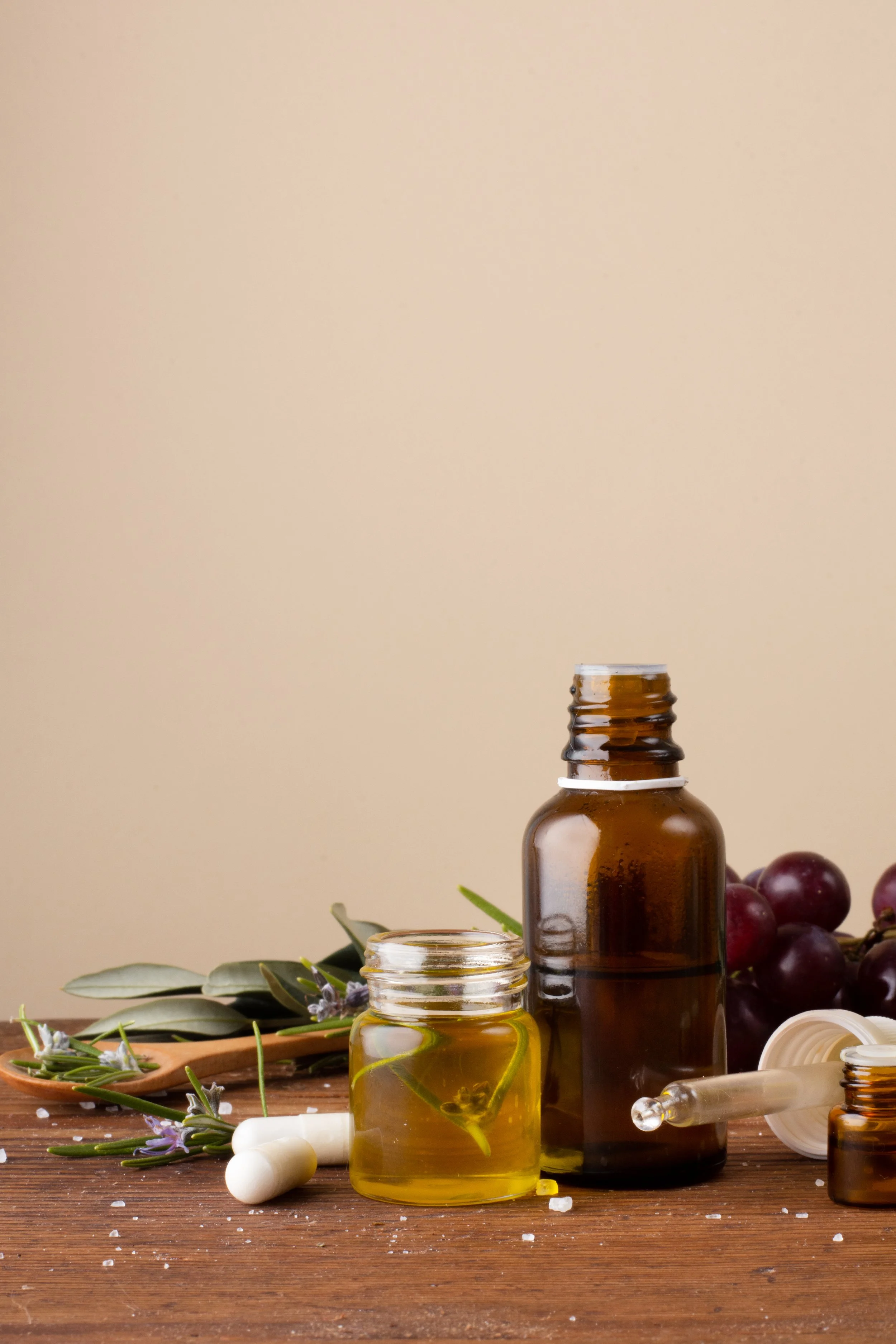 Close Up Bottles With Oil Pills Table