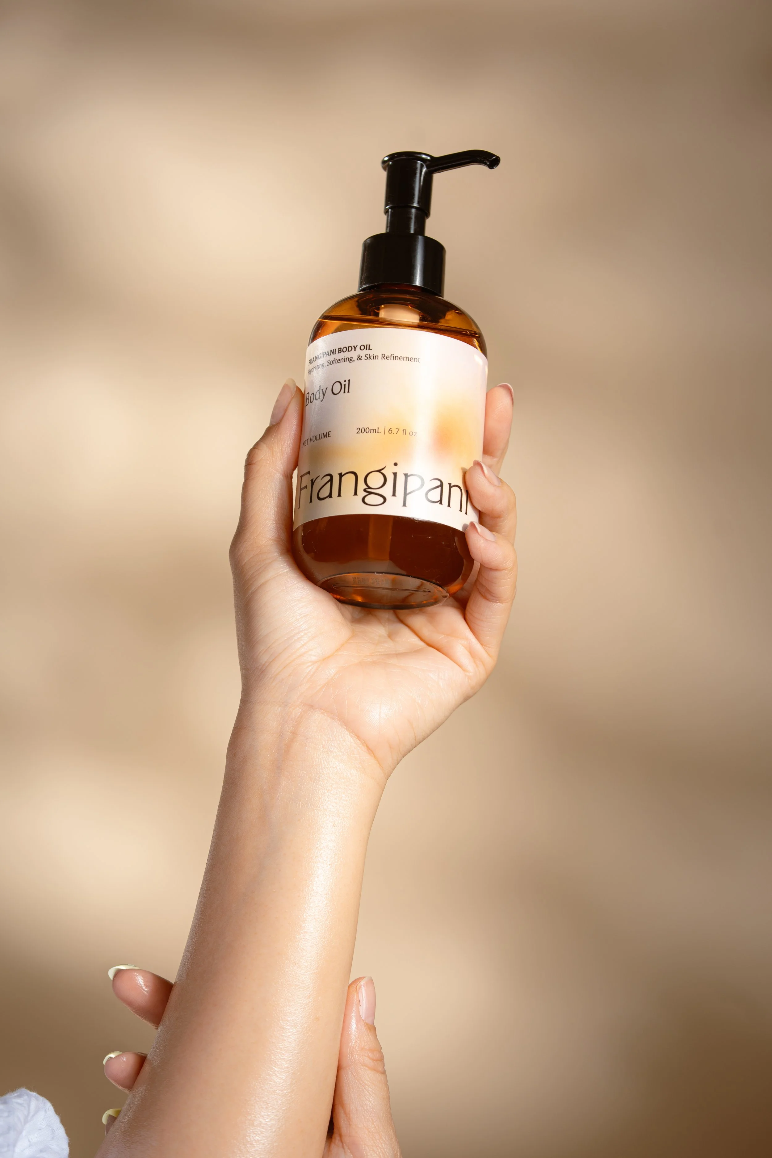 frangipani_body_oil_arms