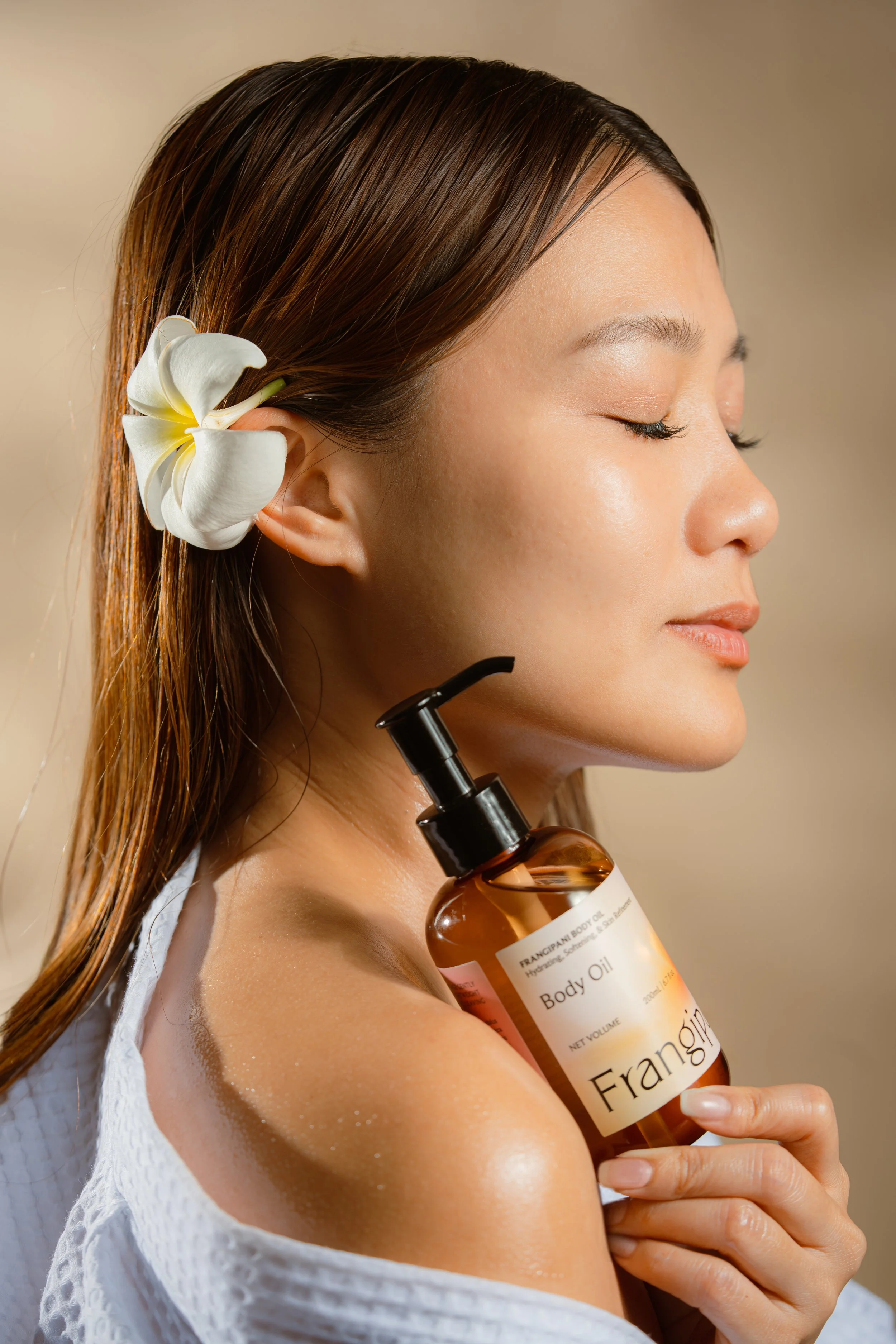 frangipani_body_oil_long_lasting_glow_skin