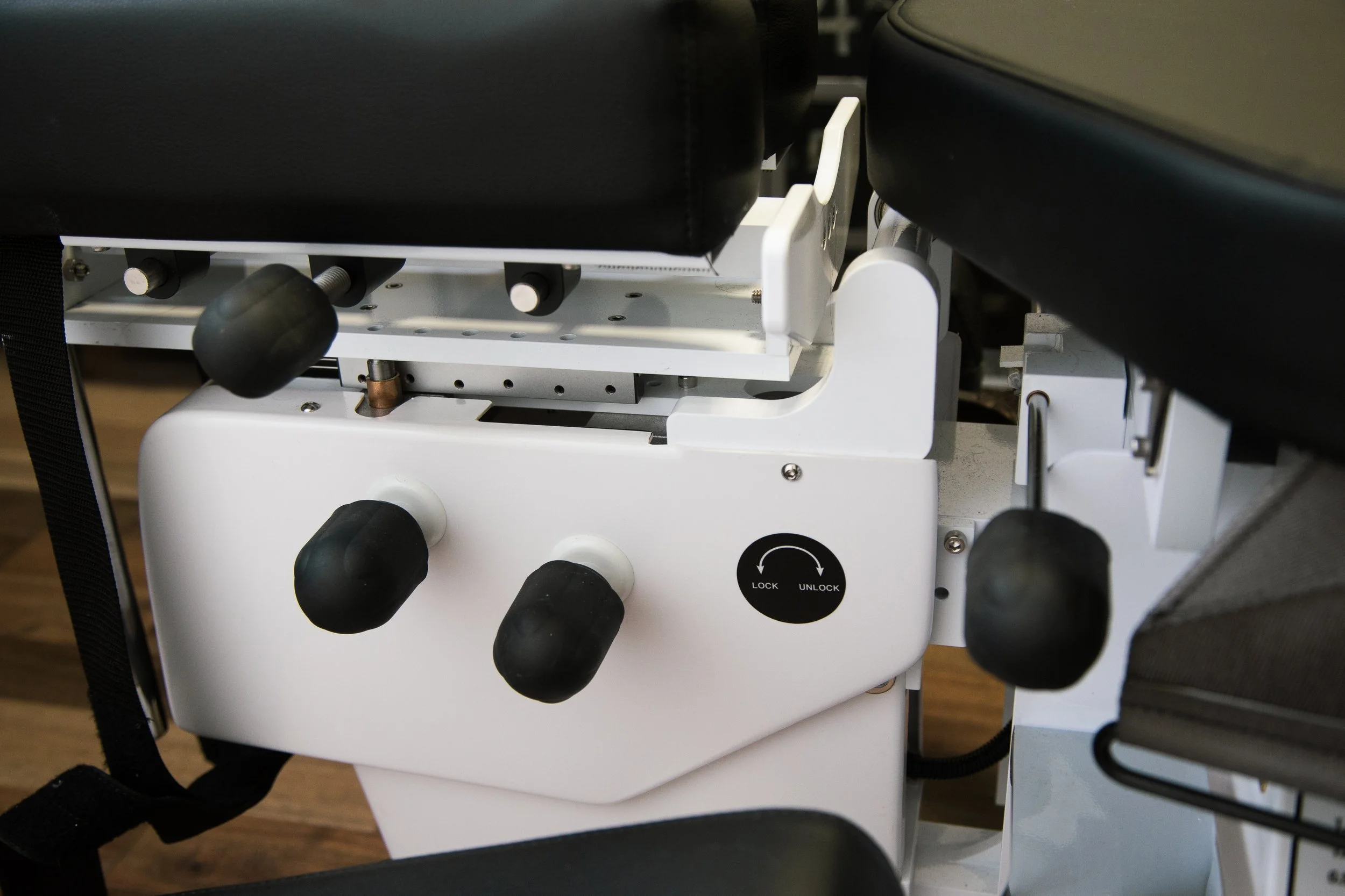 Manual controls on COX flexion-distraction table at Functional Rehab Brooklyn