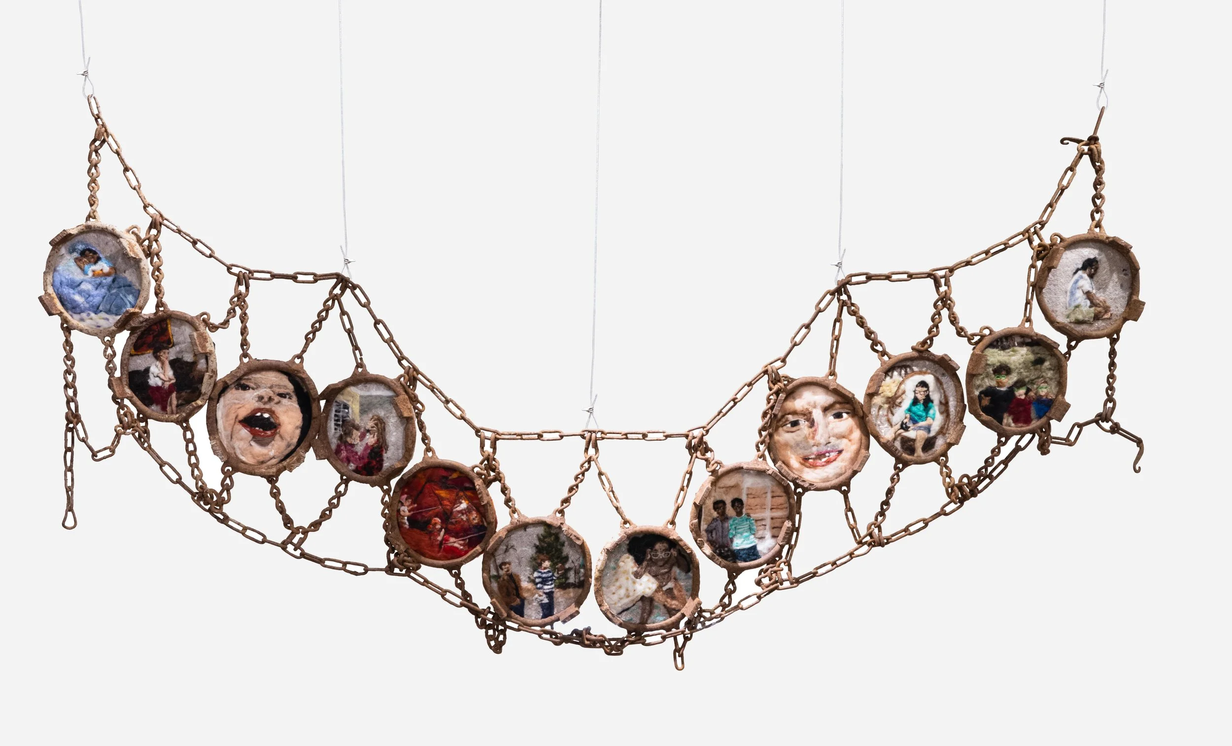 Chain Album.
Needle felted wool on industrial felt in found and dug up chain.
35 x 180 in.
2023