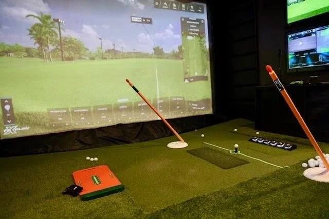 Perfect Par Golf Studio comes fully equipped with training aids, including alignment sticks, a weight shift trainer, and a down-the-line swing camera that help improve your sessions efficiently instead of simply hitting buckets of range balls. #GolfE