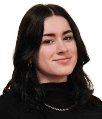 A young woman with dark hair and a slight smile, wearing a black top and silver jewelry.
