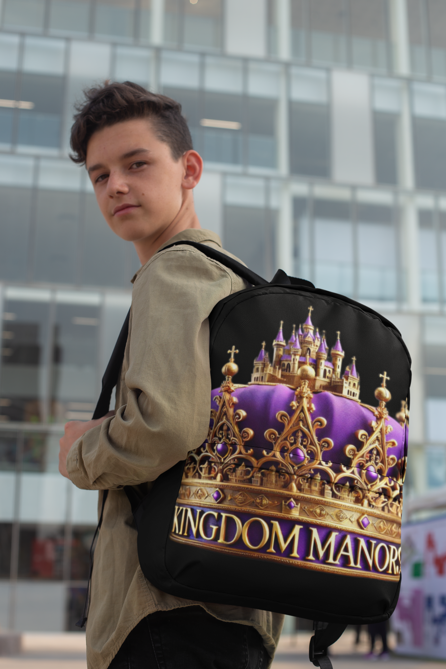 backpack-mockup-of-a-teenager-in-front-of-a-building-with-crystal-windows-27704.png