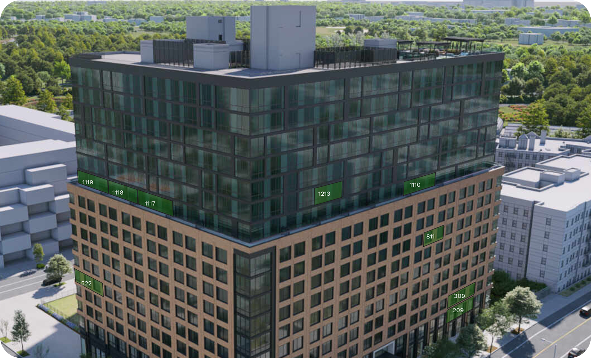 Aerial view of a modern multi-story office building with labeled windows and a surrounding cityscape of trees and buildings.