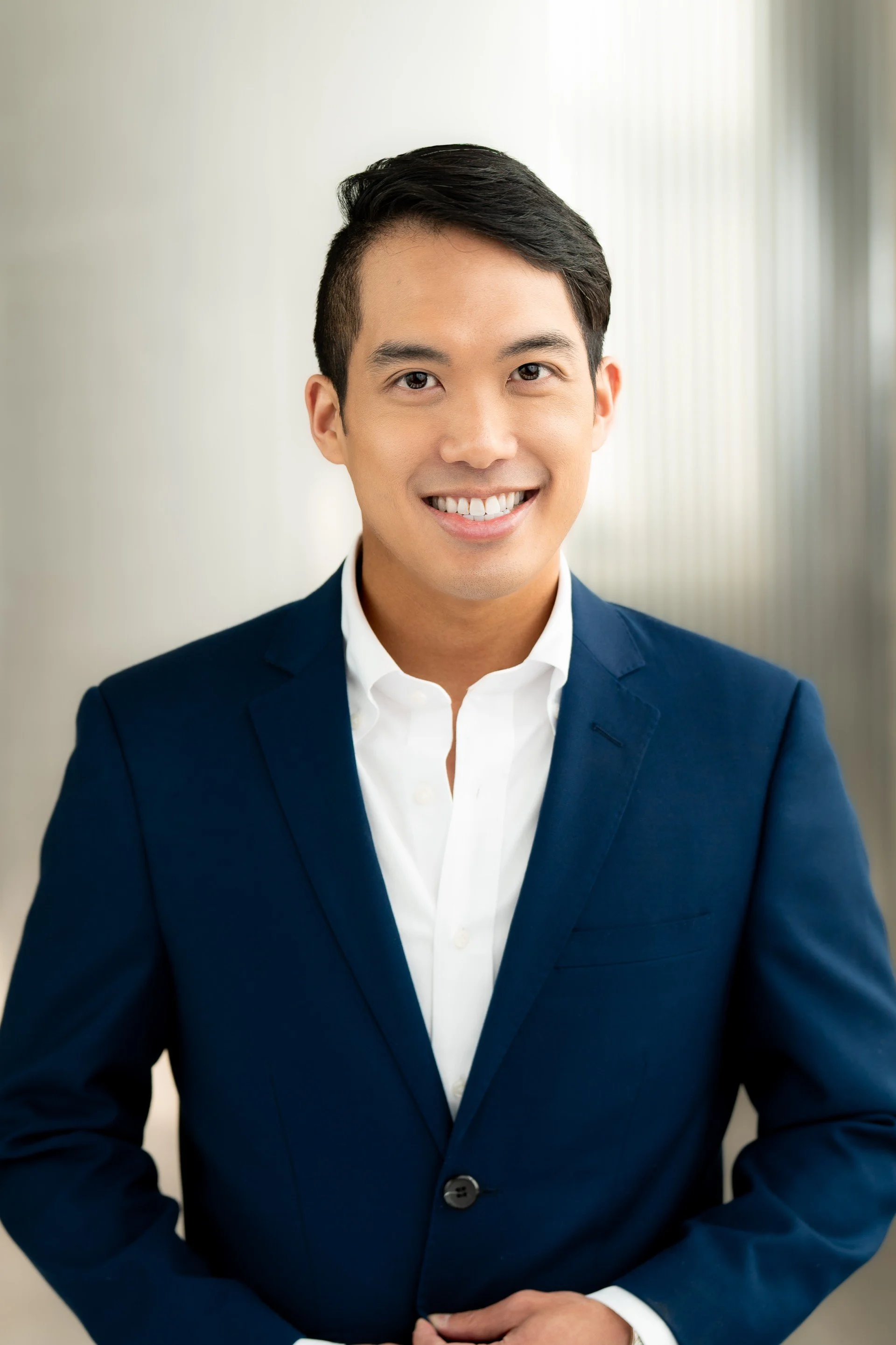 Headshot of Dr. Kenny Quang of Aesthetic Management Group