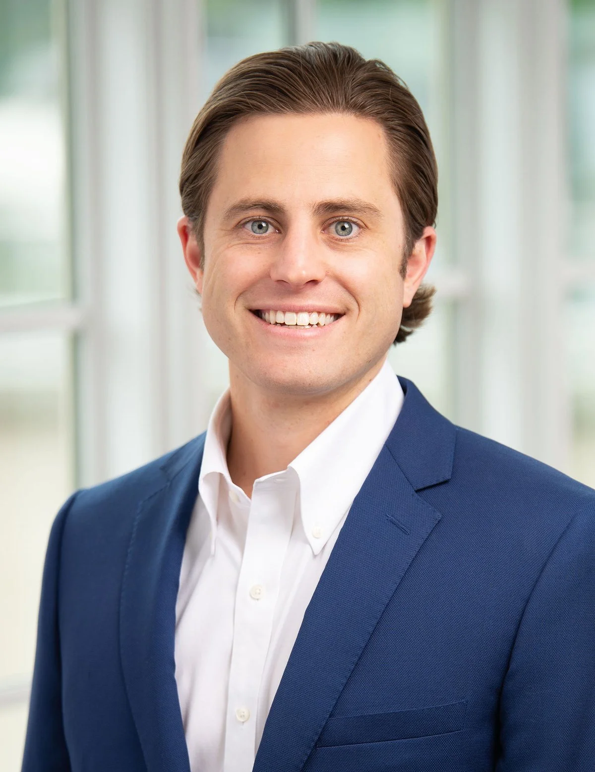 Headshot of Jordan Archer, President of Aesthetic Management Group