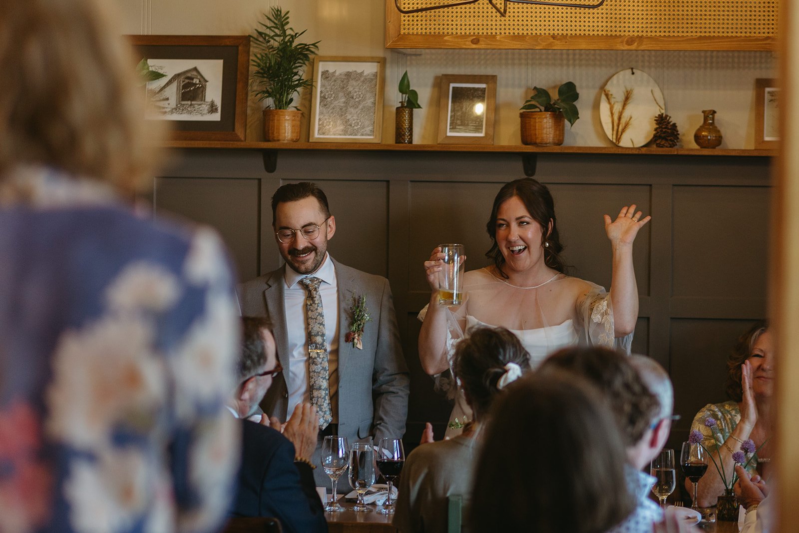 Newlyweds celebrate at their wedding reception at the Village House in Wakefield, Quebec