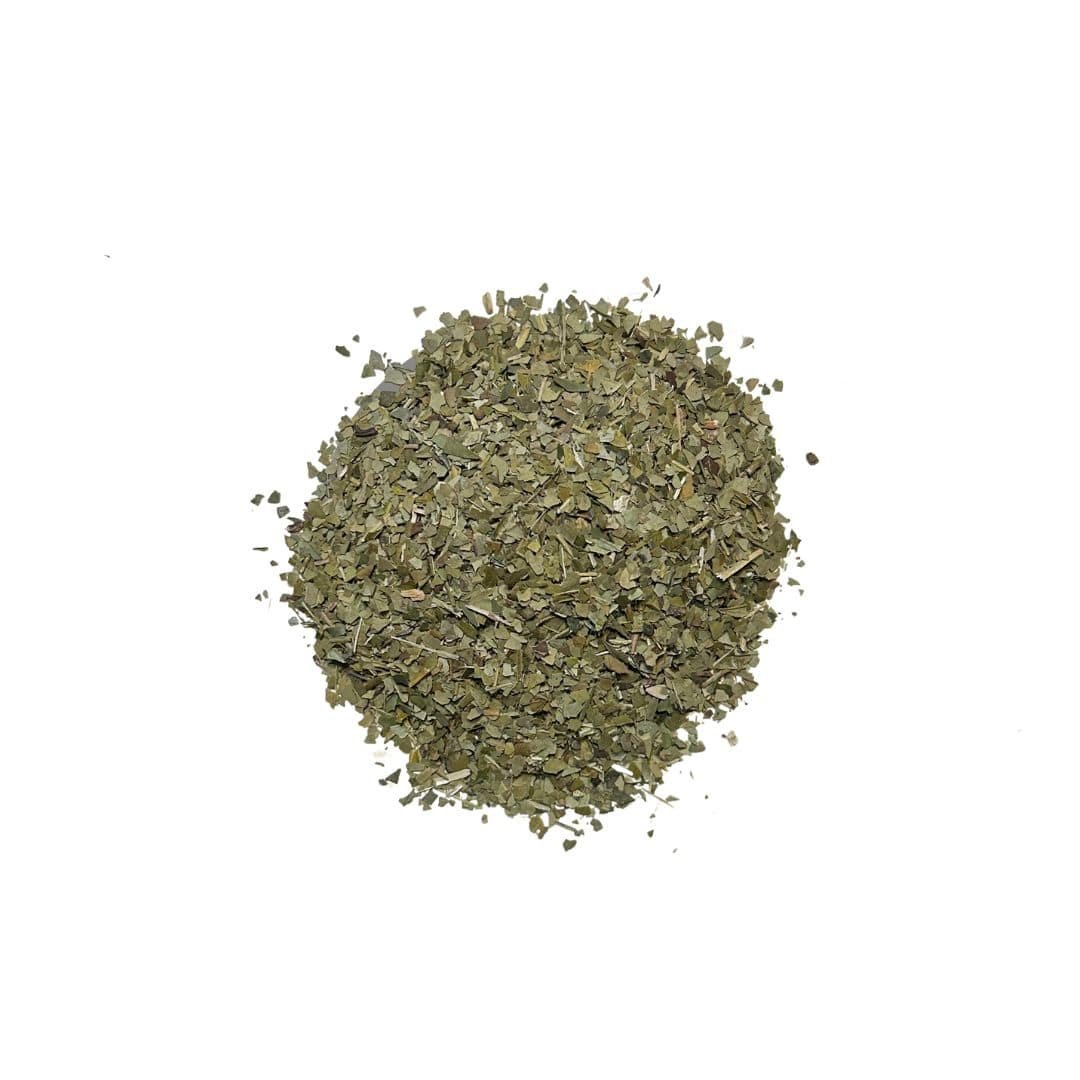 Coarsely cut dried yerba mate leaves in green and brown hues, offering an earthy and energizing scent.