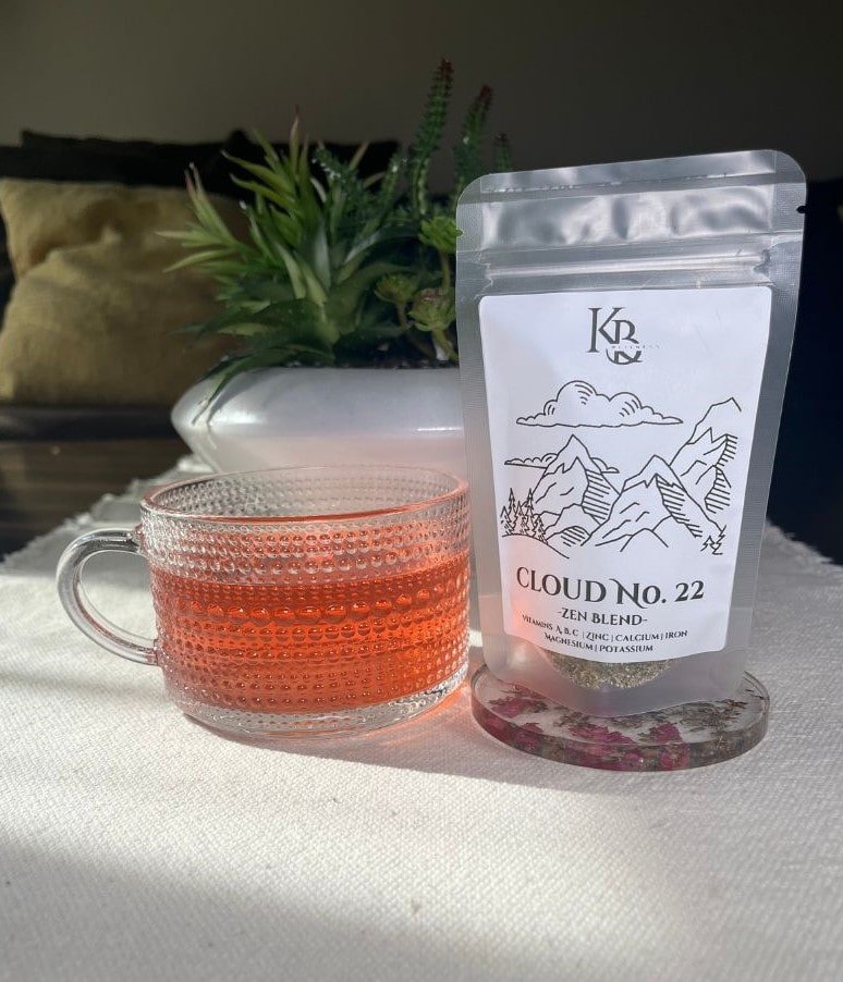 No. 22 Herbal Blend tea with a soothing mix of skullcap, passion flower, hibiscus, lemon balm, and ashwagandha, beautifully arranged with loose herbs and a tranquil teacup.