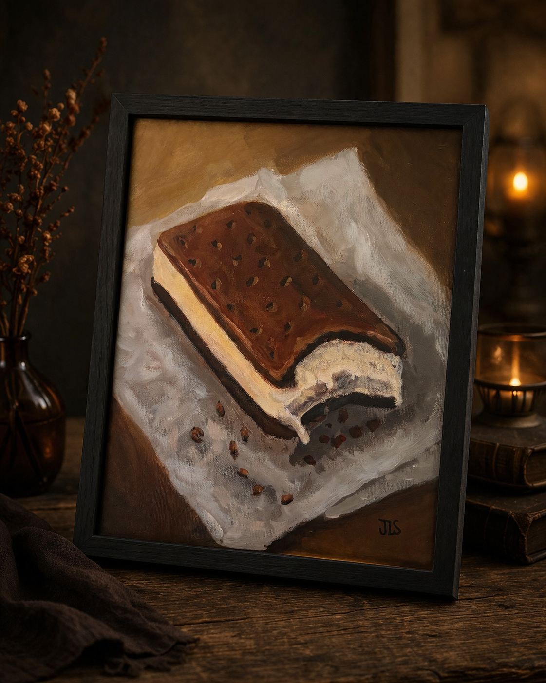 Ice cream sandwich partially eaten on wax paper with crumbs scattered across the surface