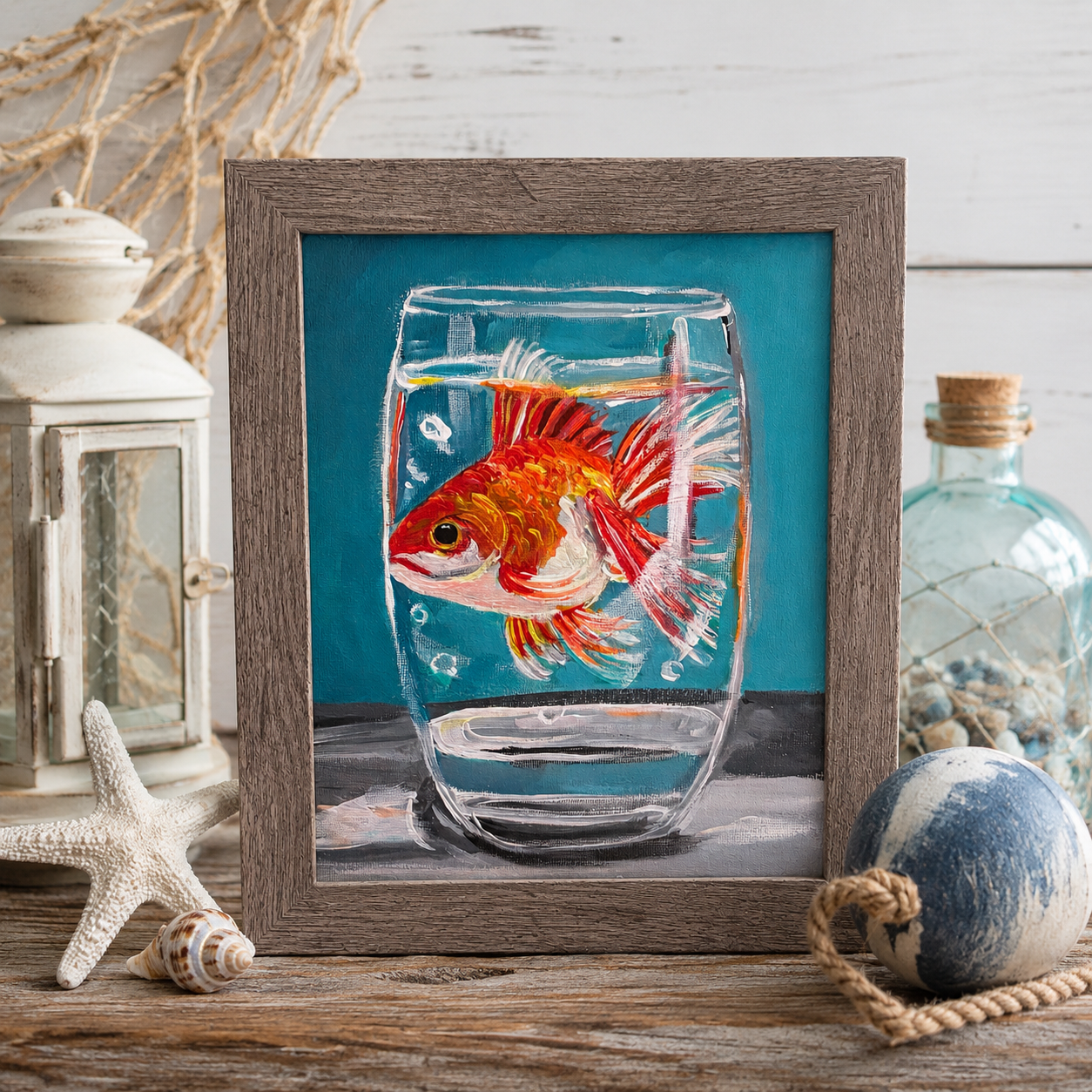 Framed painting of a bright orange and white goldfish in a glass of water with expressive brushstrokes and teal background