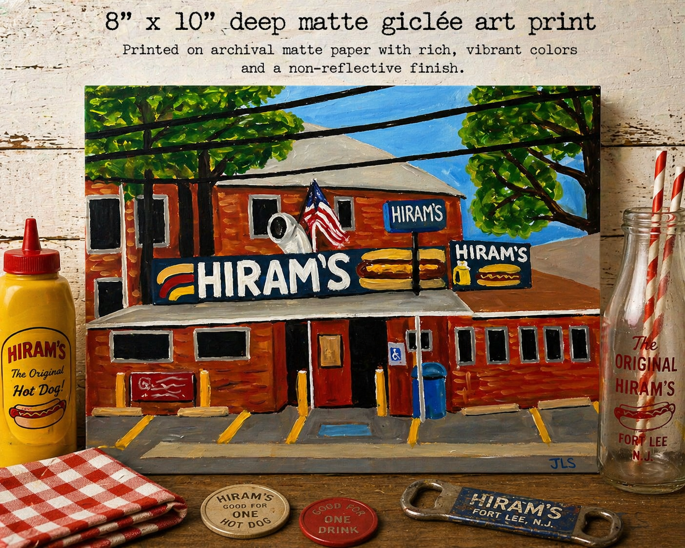 Hiram’s hot dog stand building with blue sky, trees, signage, American flag, and parking lot lines