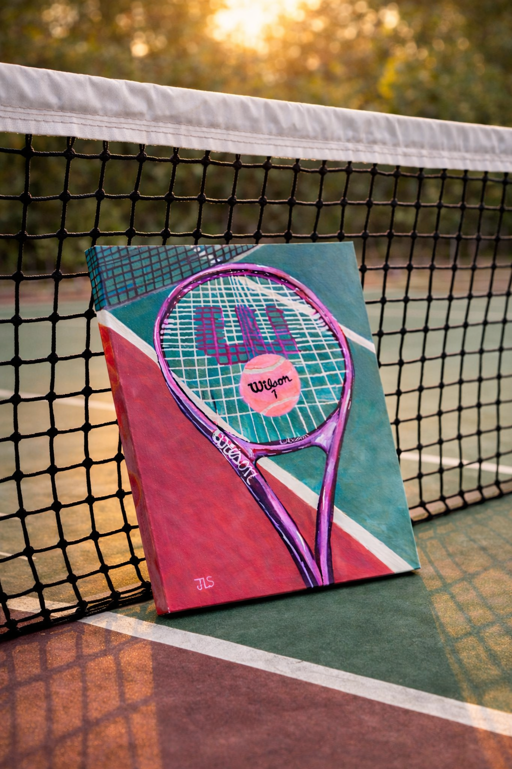 Tennis racket and tennis balls on a court surface