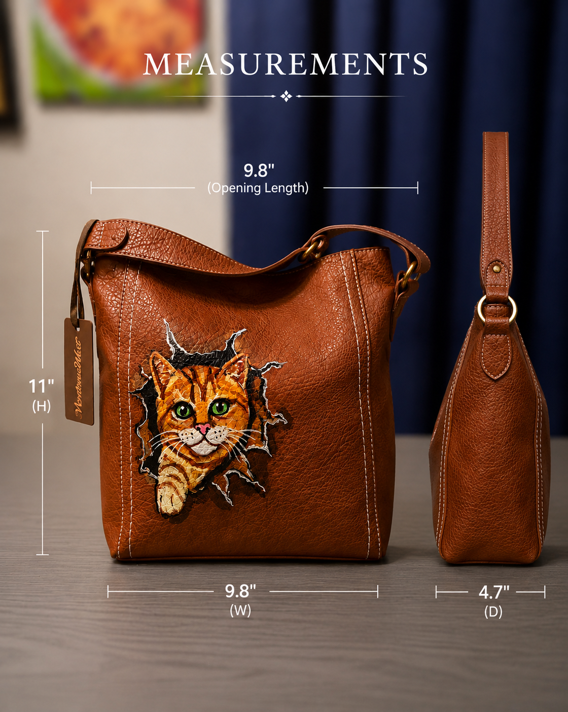 Cognac Montana West hobo handbag with hand-painted orange tabby cat artwork and gold-tone hardware.