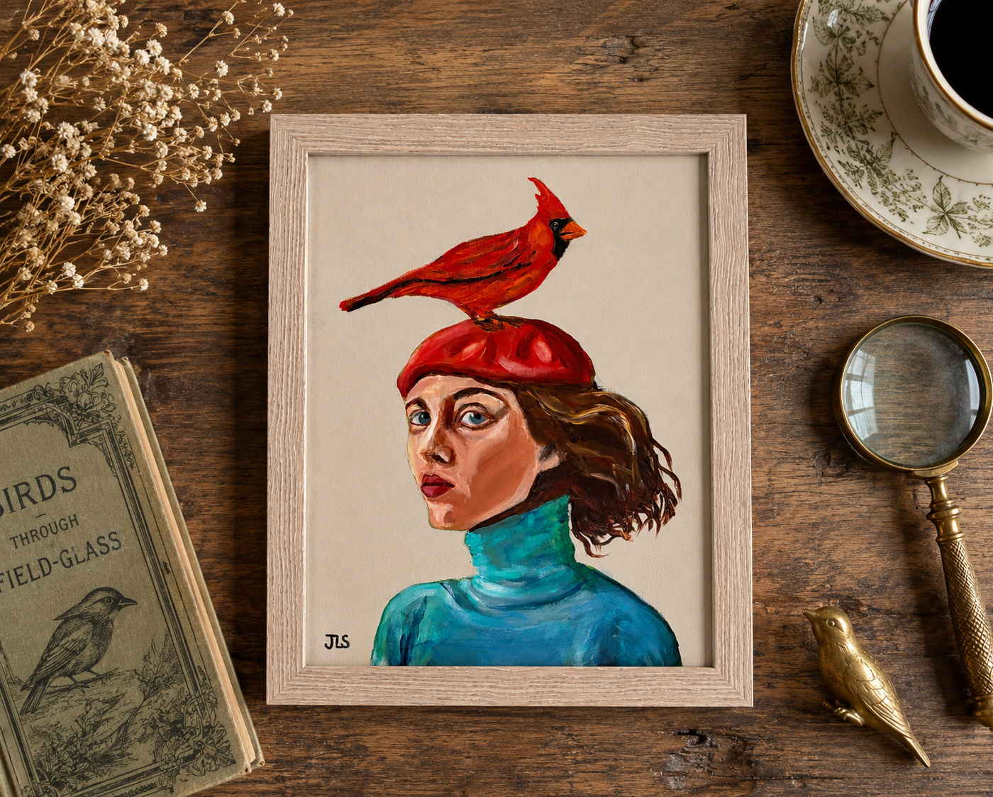 Expressive portrait of a woman wearing a red beret with a cardinal bird standing on her hat and loose brown hair blowing to the side.