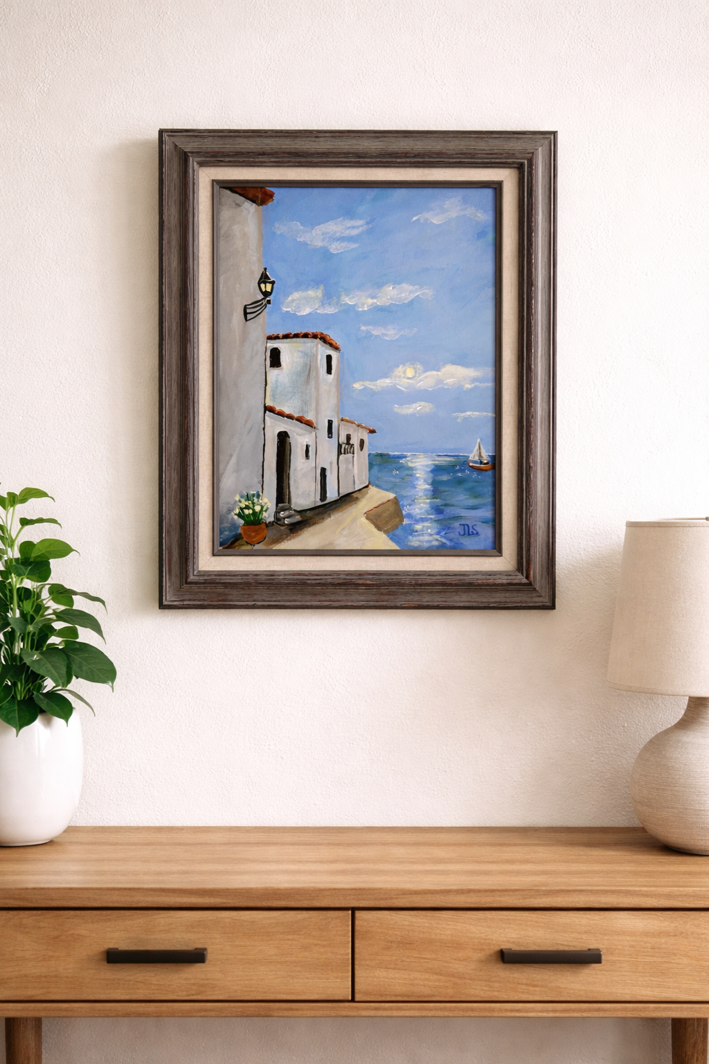 Painting of white coastal buildings by the sea with blue sky, ocean view, and small sailboat, Mediterranean seaside scene artwork