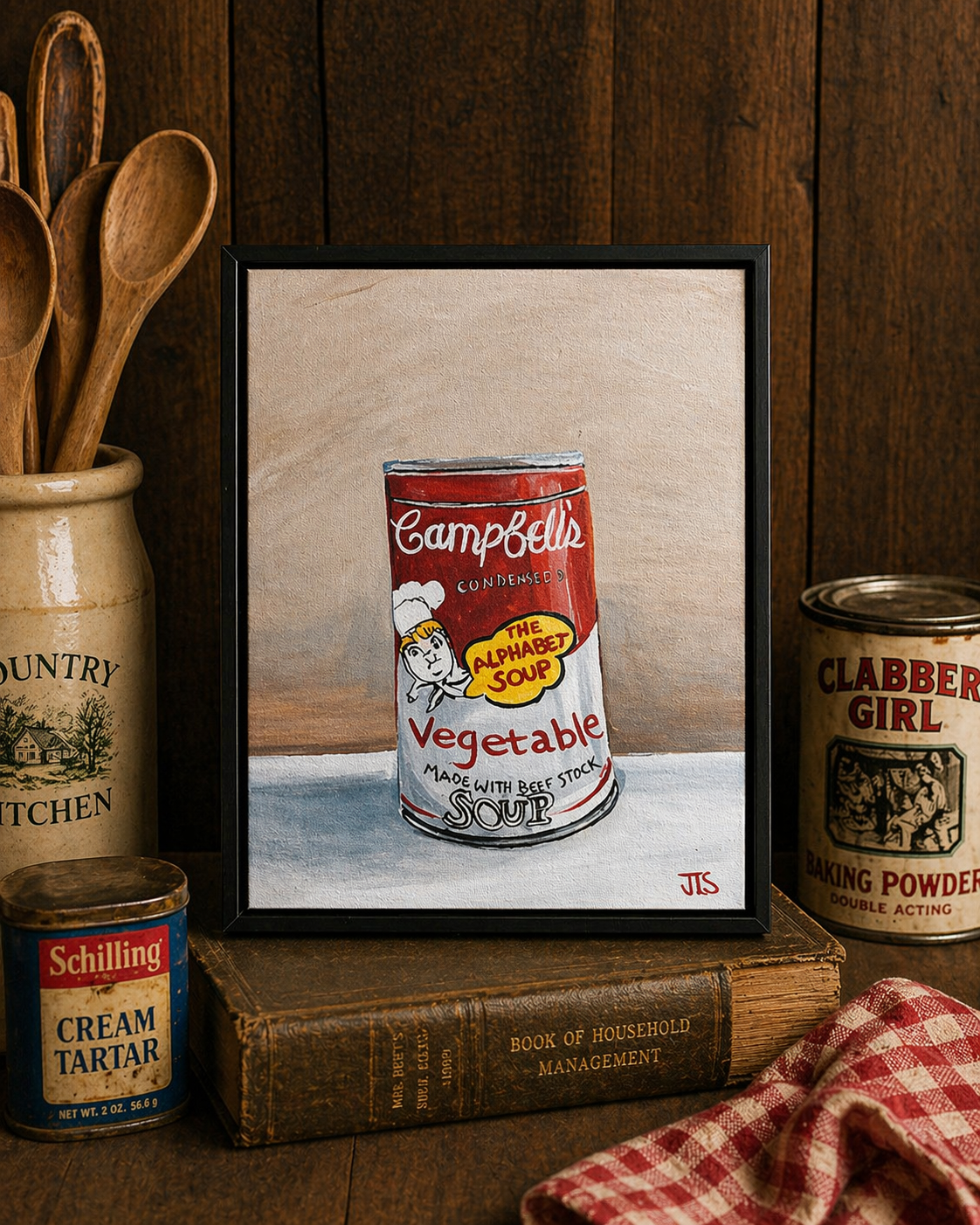 Red and white Campbell’s soup can labeled vegetable alphabet soup with small chef character illustration