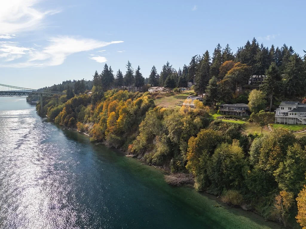 Aerial waterfront view of the Gig Harbor home remodel location overlooking the Tacoma Narrows, completed by a local remodeling contractor.