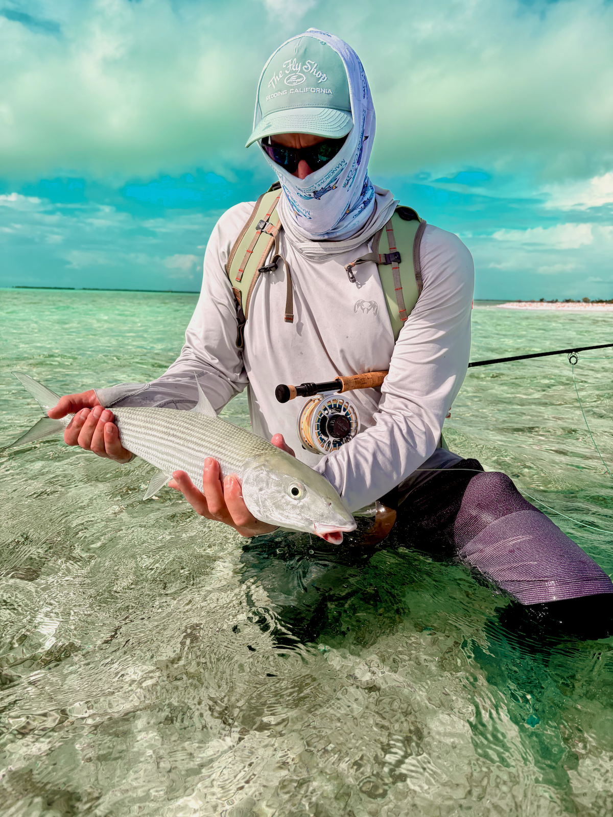 Angler displays bonefish from Kiritimati Lagoon flats on an Isolation Outfitters hosted trip in 2026