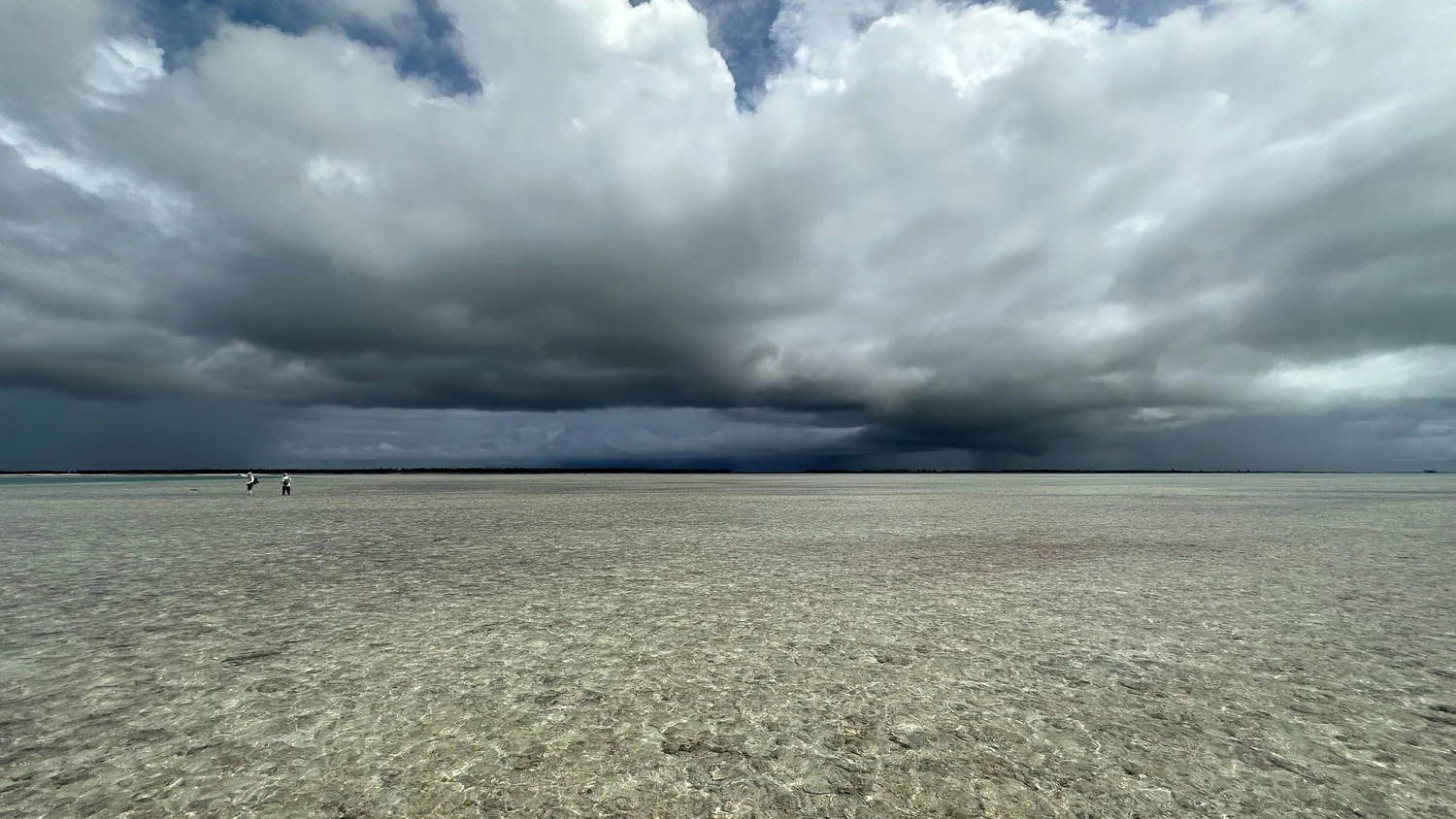 Anglers and guide fishing the flats on Christmas Island