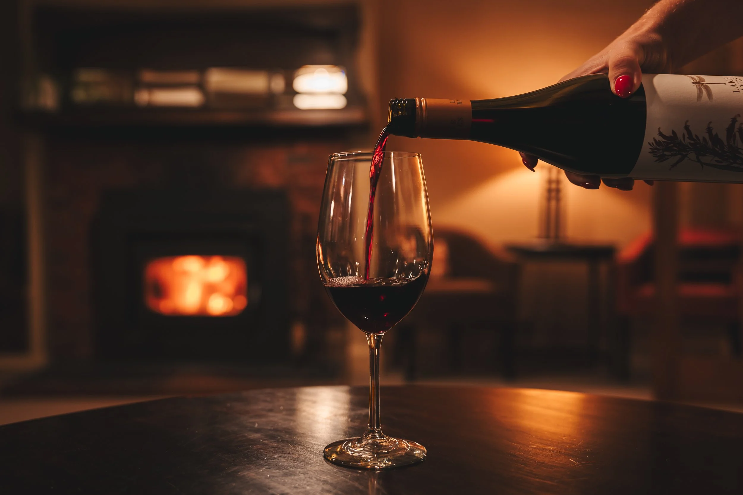 4.1.1.4 Int - Lounge - Wine by the Fire.jpg