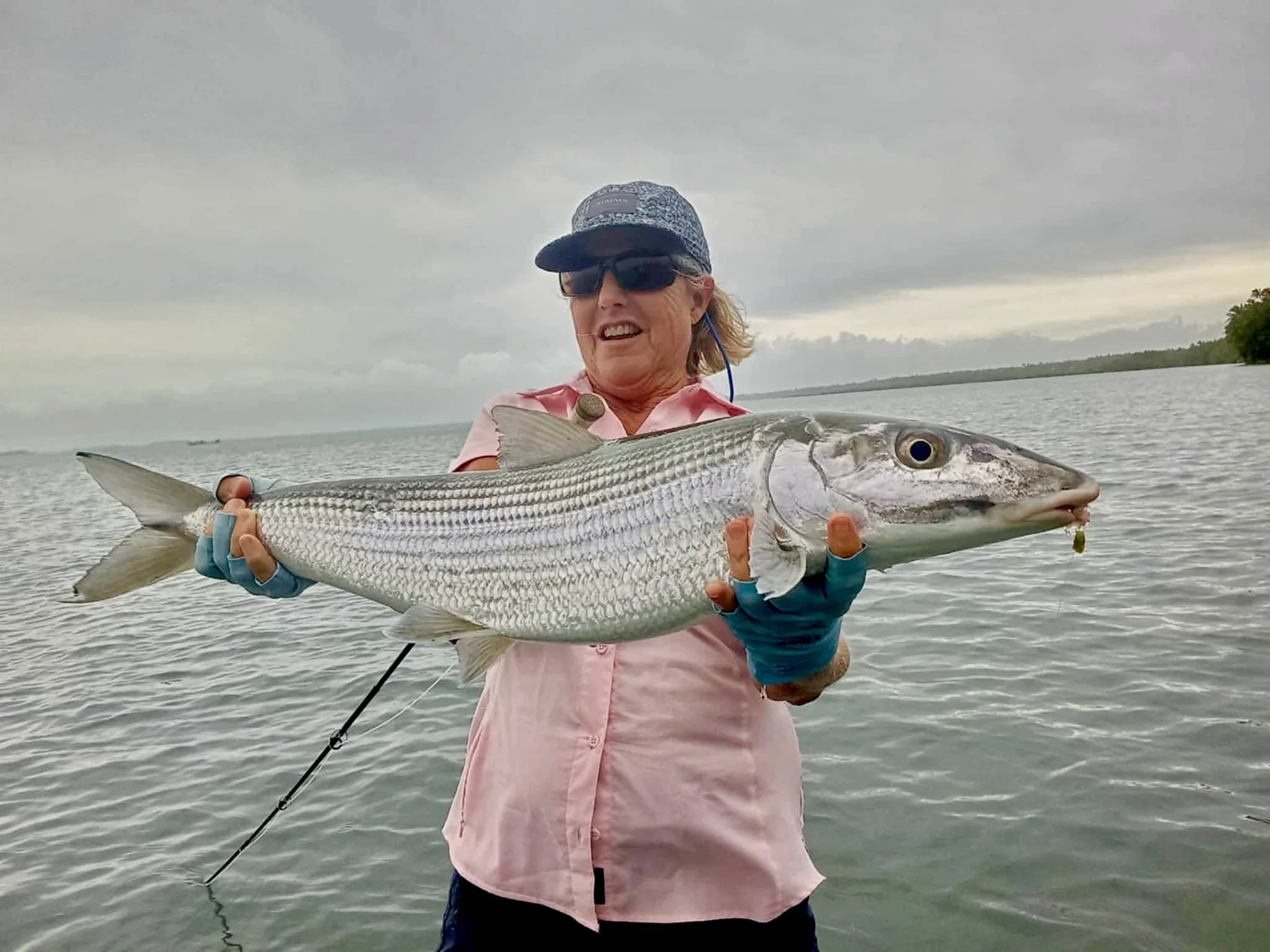 Clear lagoon flats during a hosted fly fishing trip to Aitutaki