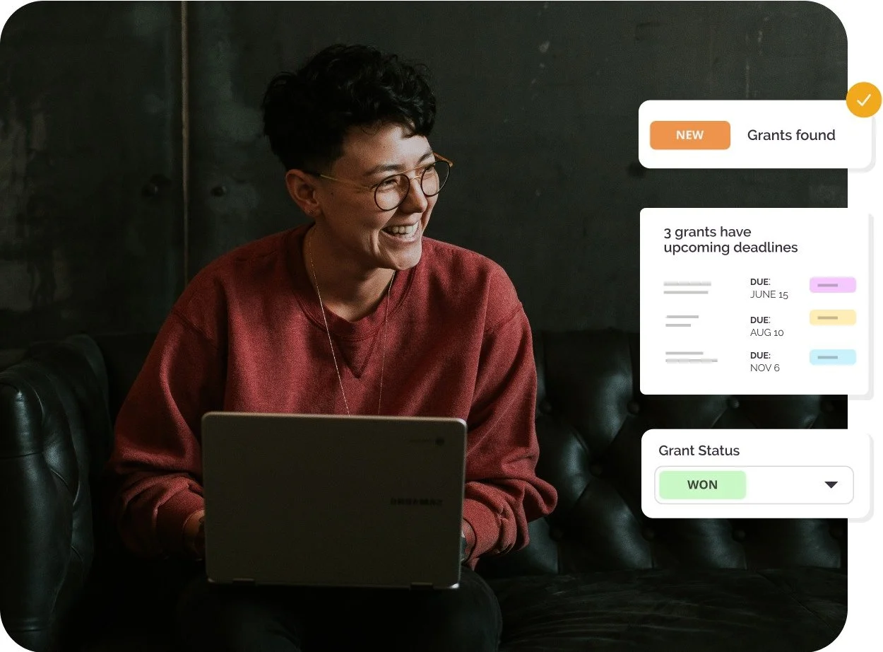 Instrumentl Website image- user smiling while working on their laptop. On the right side of the screen, there are icons reading that "New grants found," "3 grants have upcoming deadlines," and "Grant Status- Won"