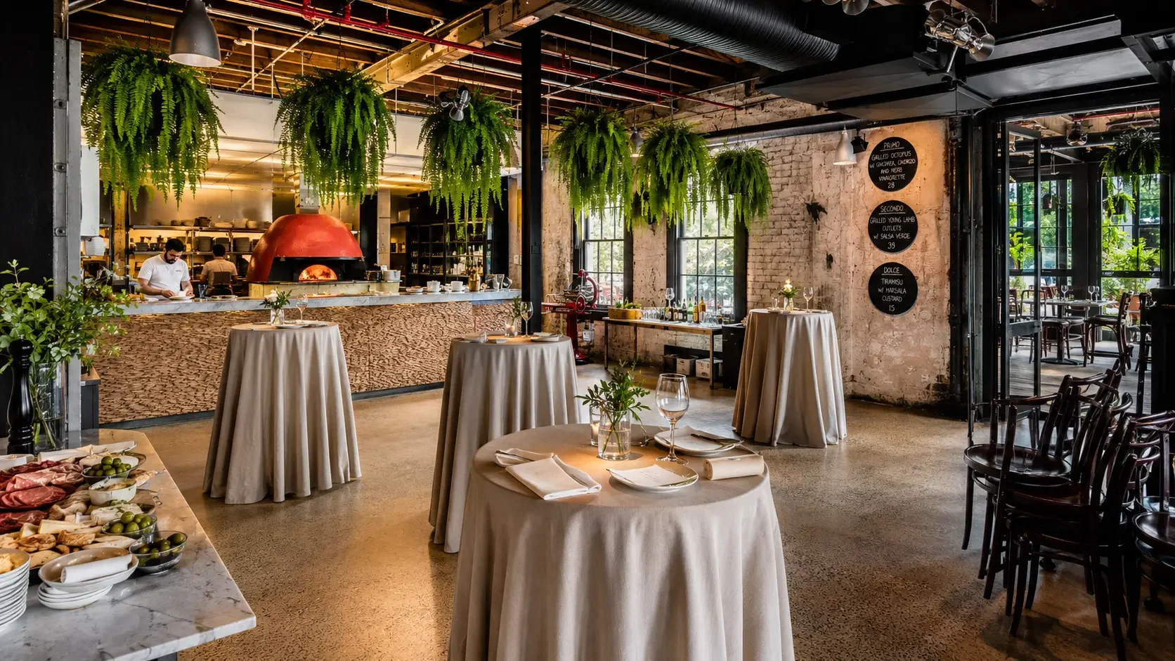 Da Mario inside dining room set up for cocktail reception in Rosebery Sydney with wood-fired pizza oven