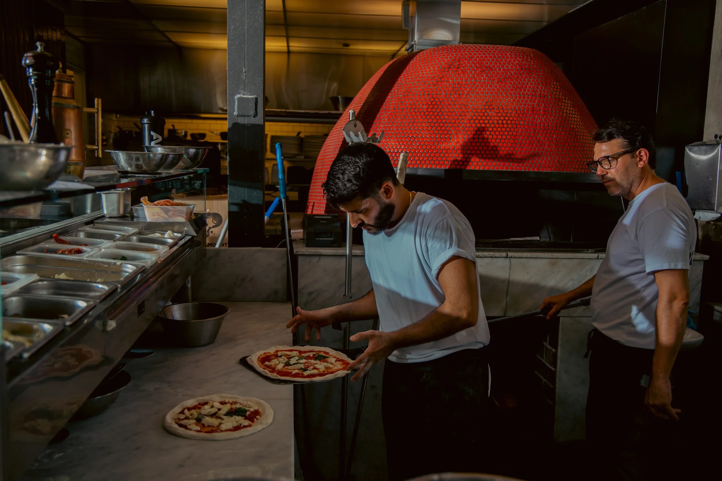 Halal italian restaurant Sydney - wood-fired Margherita pizza and handmade seafood pasta at Da Mario Rosebery