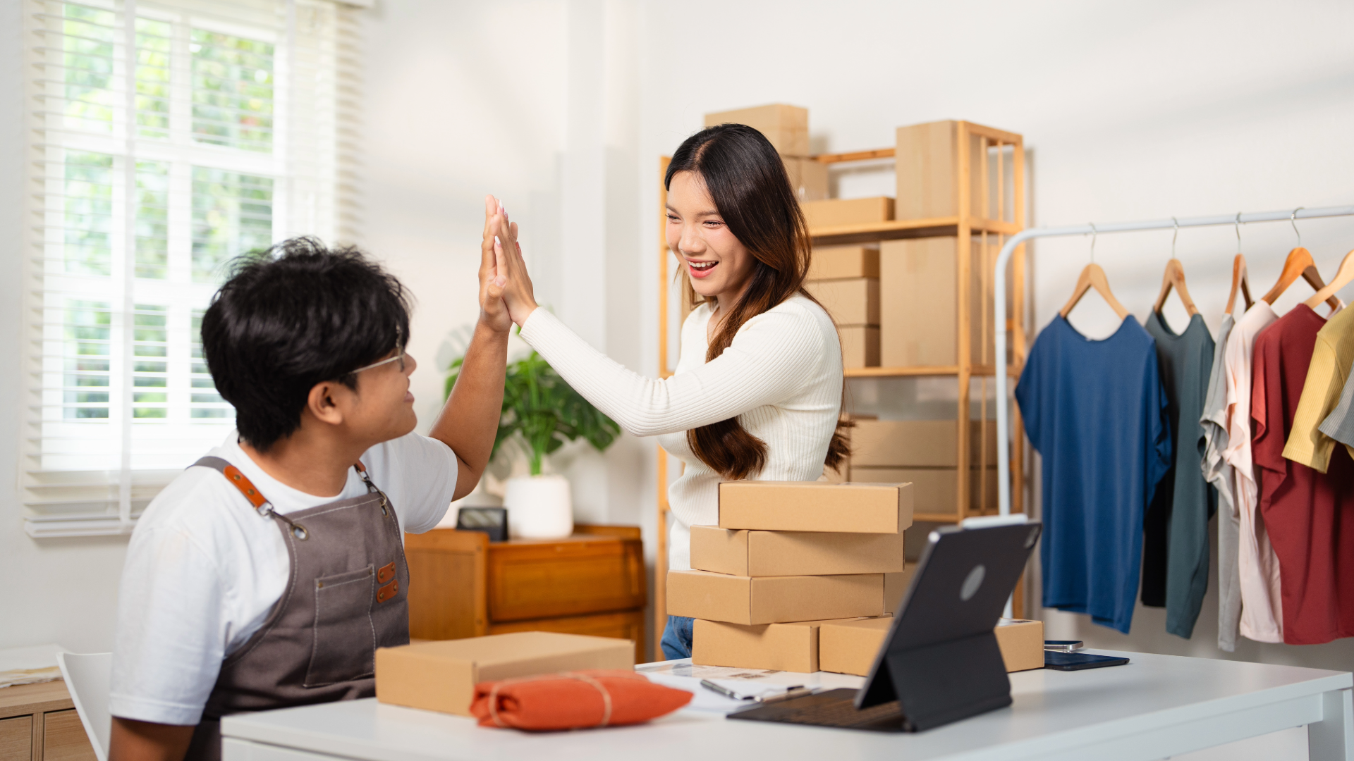 A team celebrating creating a demand forecast without having sales history to start from