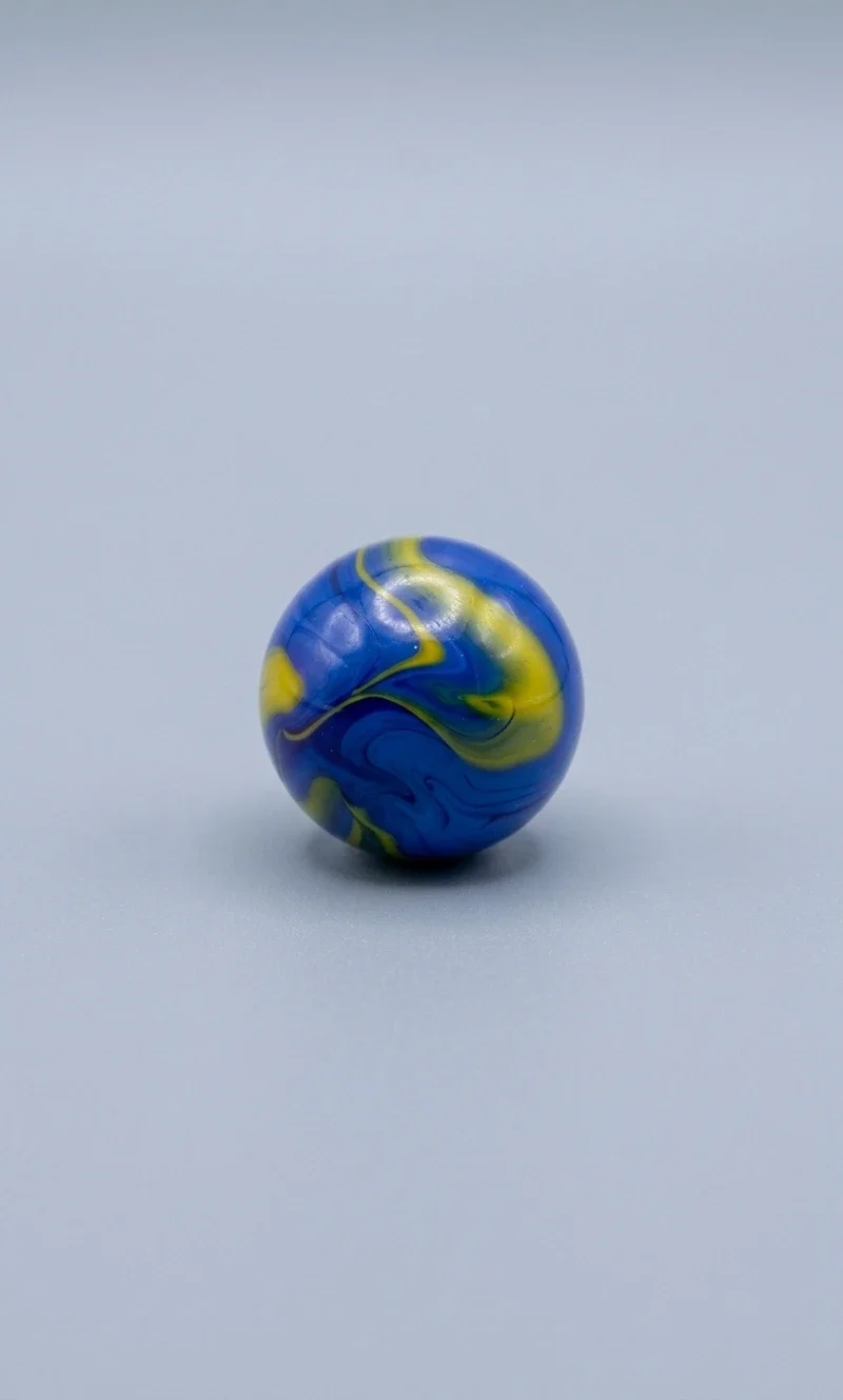 Centered Van Gogh marble sphere on a light heather grey background
