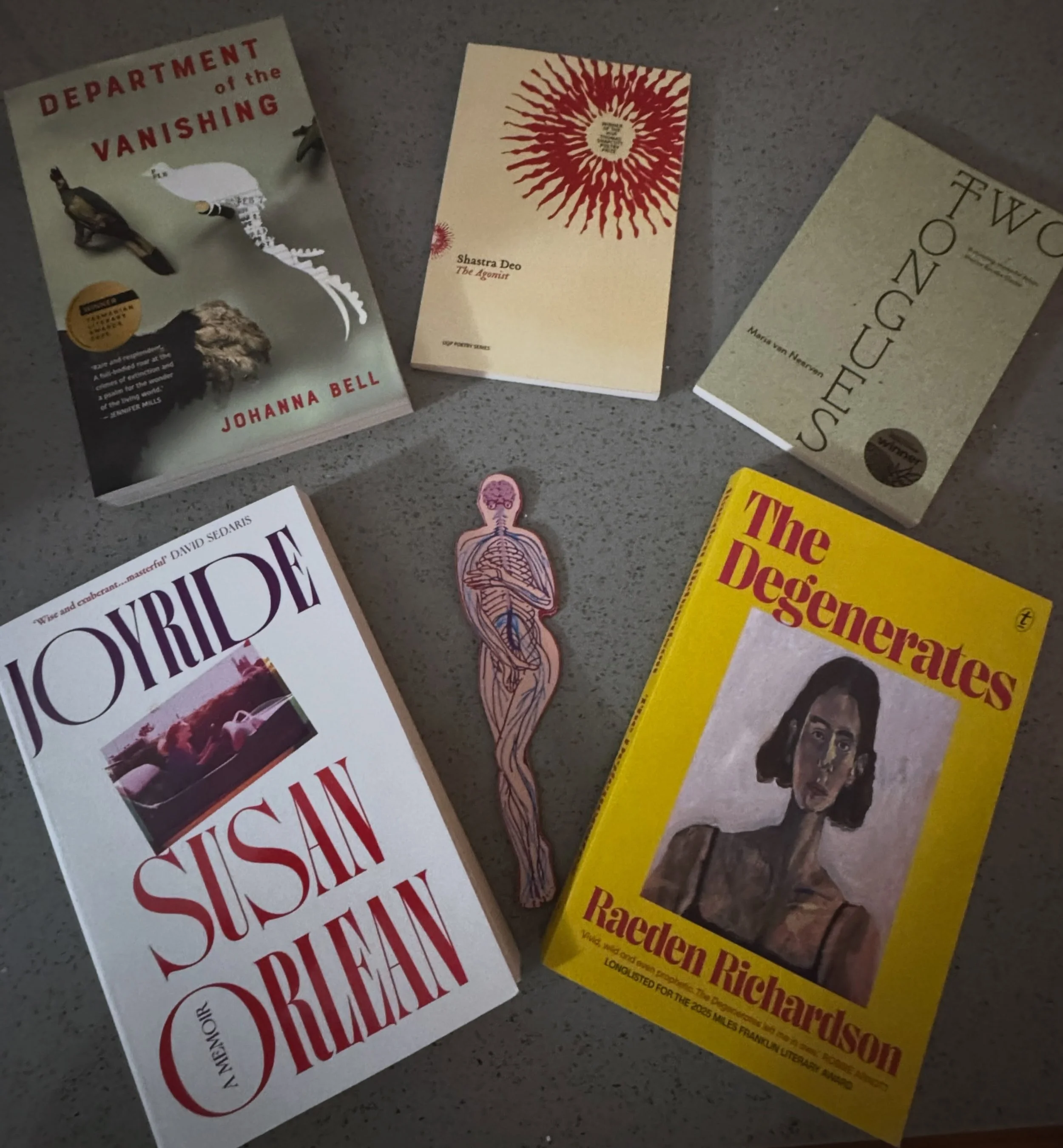 Here&rsquo;s my book haul at @briswritersfest 
thanks @harryhartogbookseller 
bookmark from the @p.s.powerhousestore 

(and as a stereotypical UQ postgrad student in Master of Writing, Editing and Publishing fashion, I went up to the New Farm library